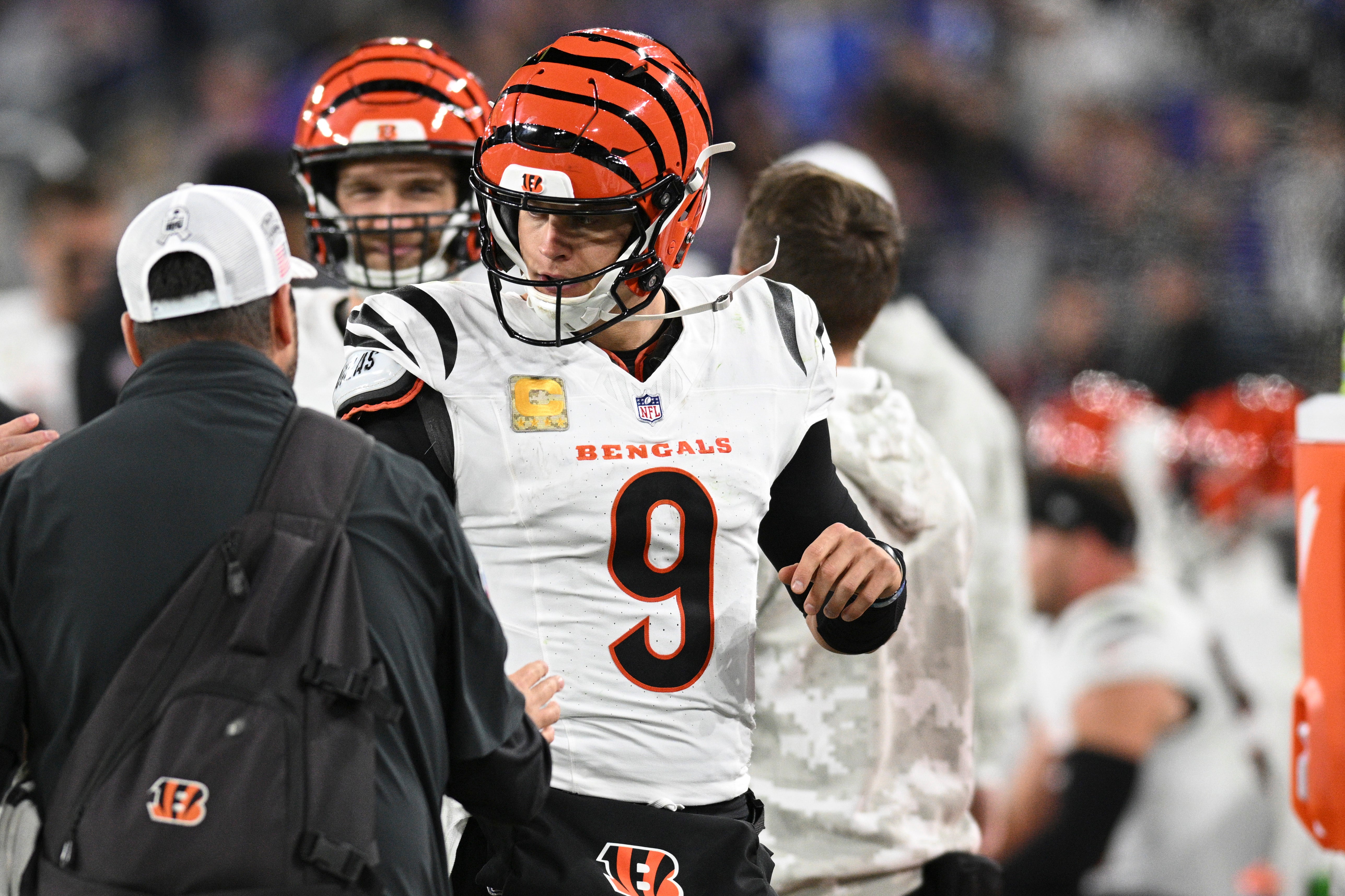 Nov 7, 2024; Baltimore, Maryland, USA; Cincinnati Bengals quarterback Joe Burrow (9) celebrates with teammates after throwing a touchdown during the second half against the Baltimore Ravens at M&T Bank Stadium.