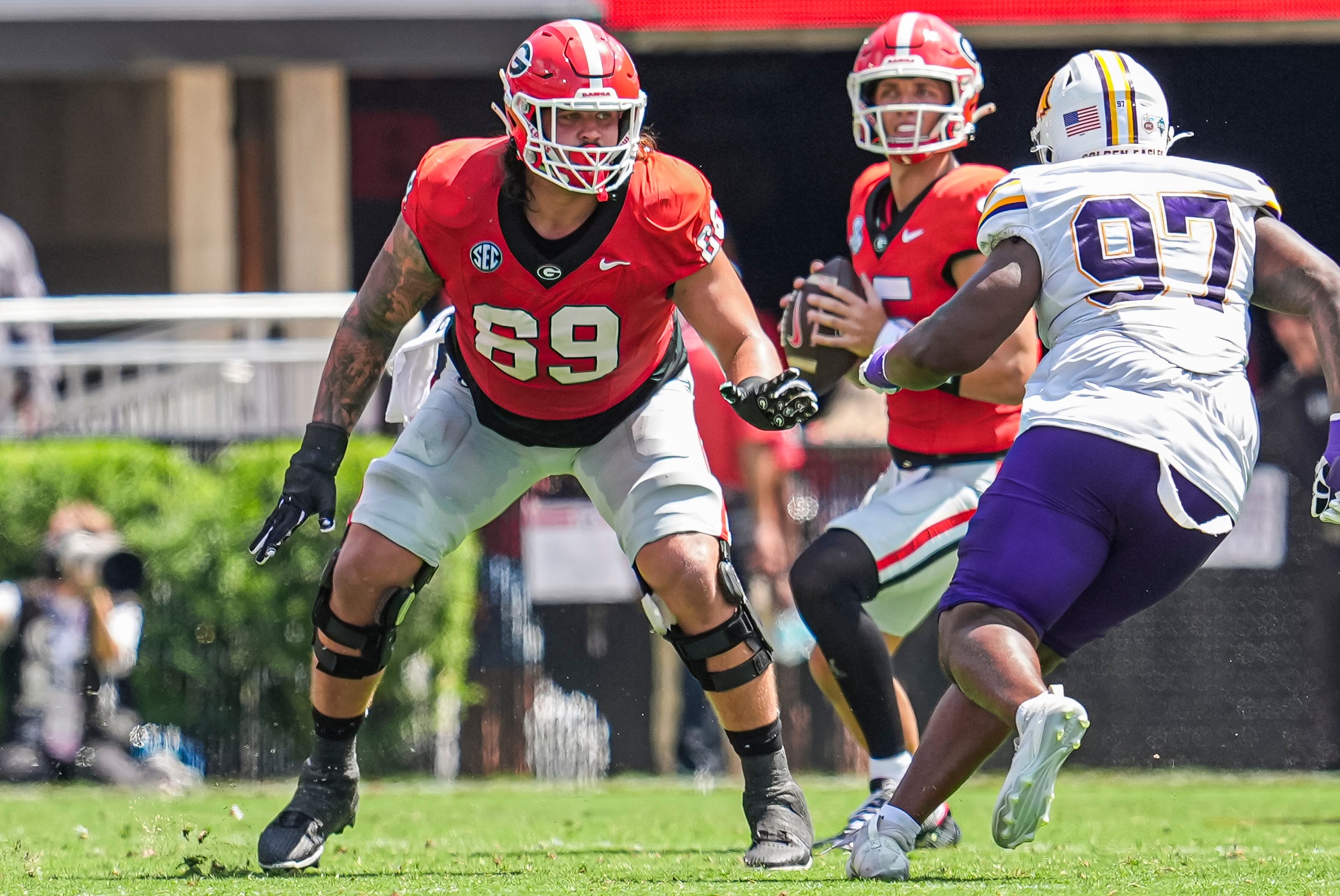 Sep 7, 2024; Athens, Georgia, USA; Georgia Bulldogs offensive lineman Tate Ratledge (69) blocks against the Tennessee Tech Golden Eagles during the first half at Sanford Stadium.