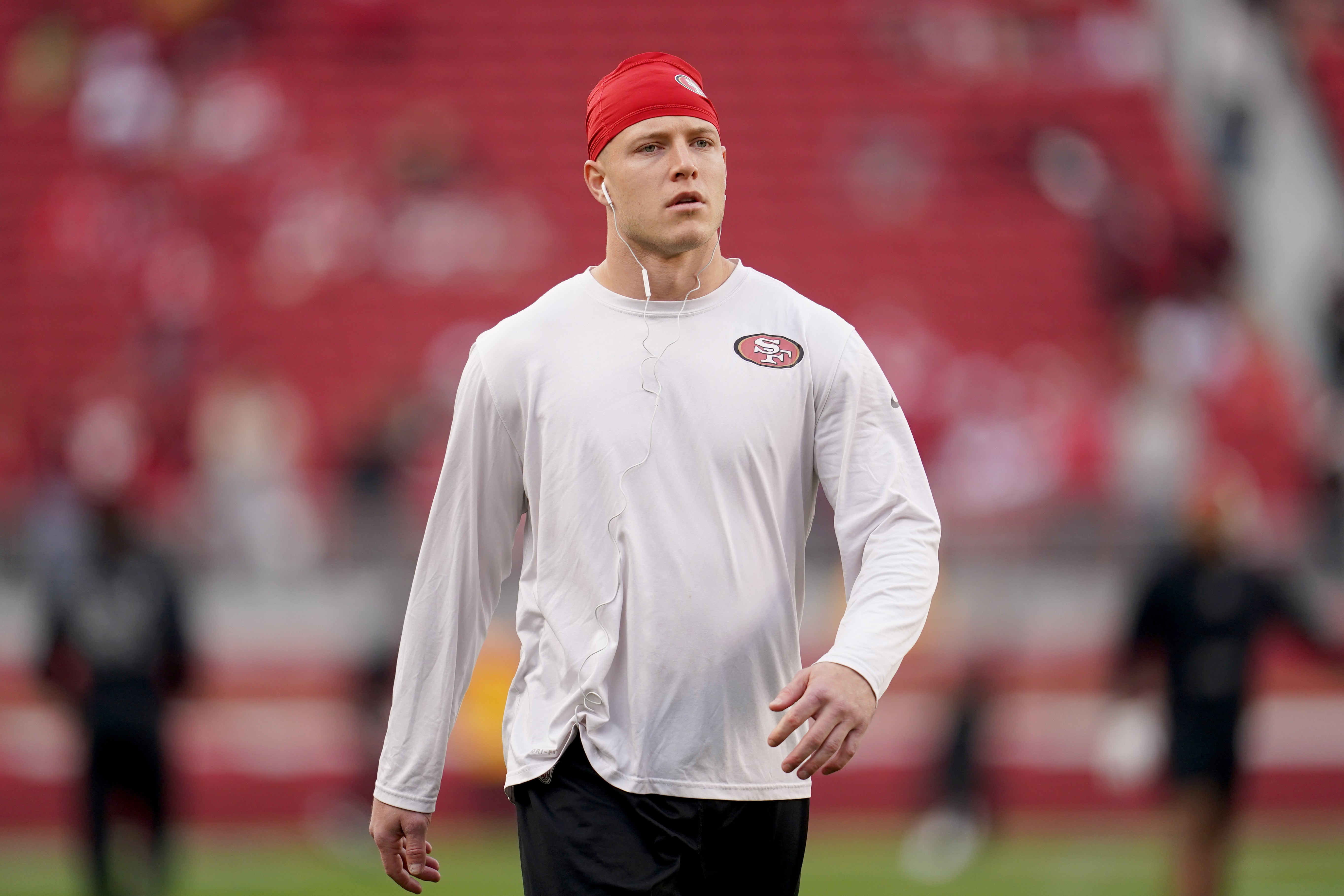 San Francisco 49ers running back Christian McCaffrey (23) walks on the field before the start of the game against the Baltimore Ravens at Levi's Stadium.