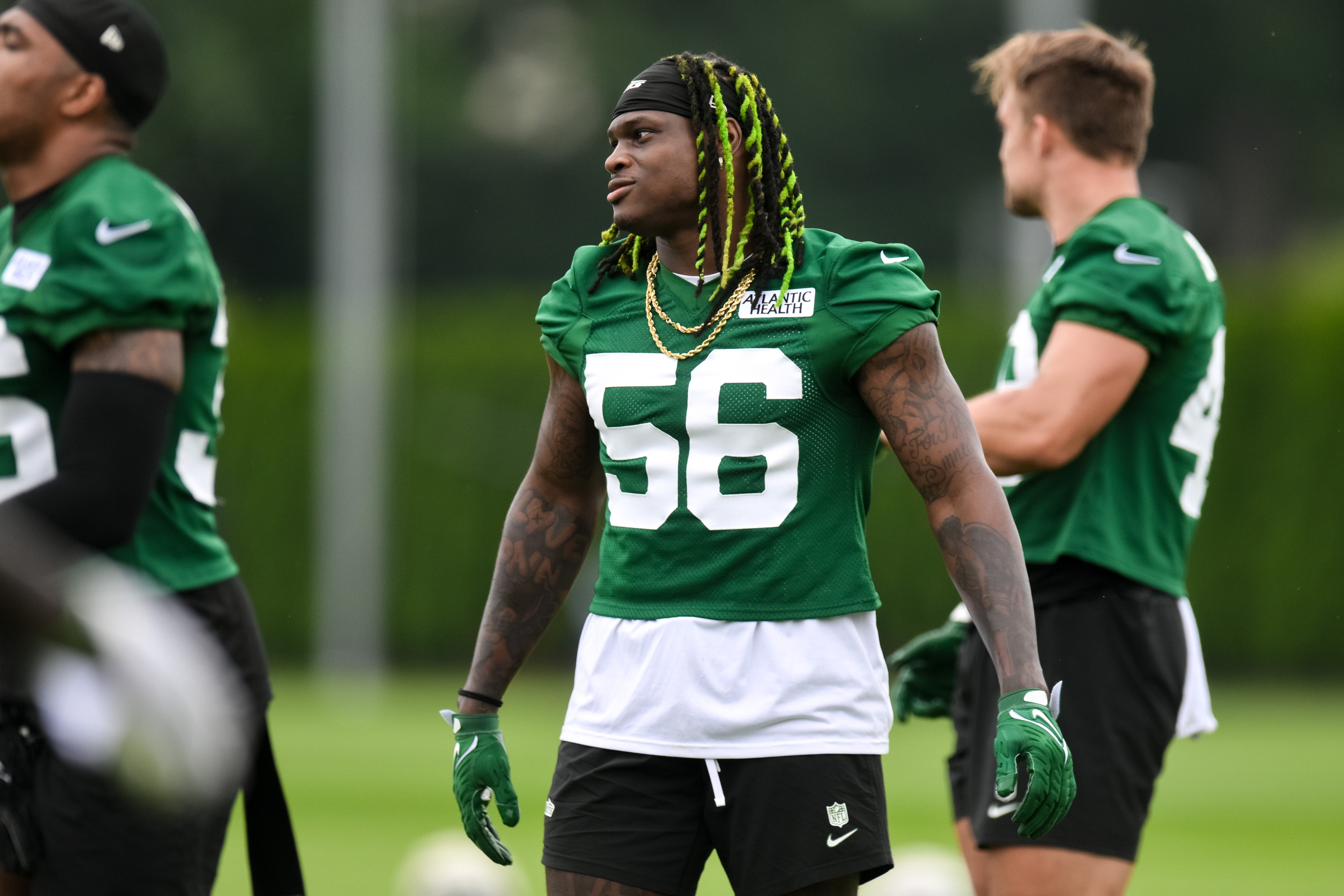 New York Jets linebacker Quincy Williams (56) warms up during training camp at Atlantic Health Jets Training Center.