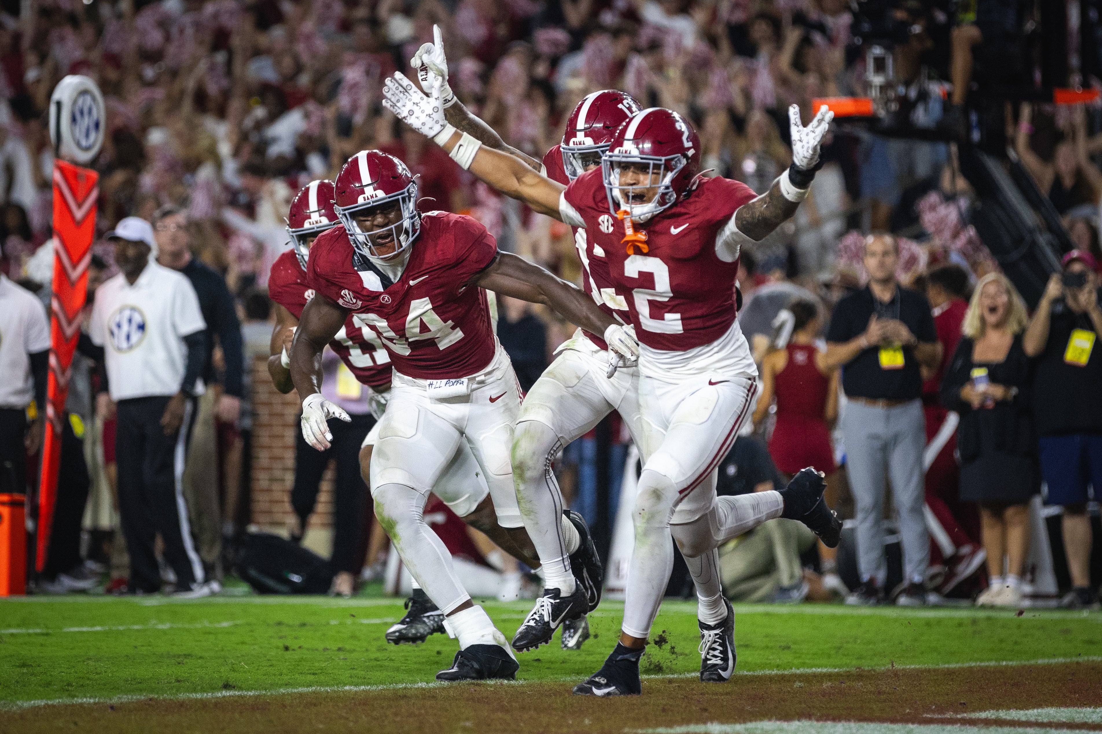 Sep 28, 2024; Tuscaloosa, Alabama, USA; Alabama Crimson Tide defensive back Zabien Brown (2) and linebacker Que Robinson (34) celebrate after an interception against the Georgia Bulldogs in the fourth quarter at Bryant-Denny Stadium.