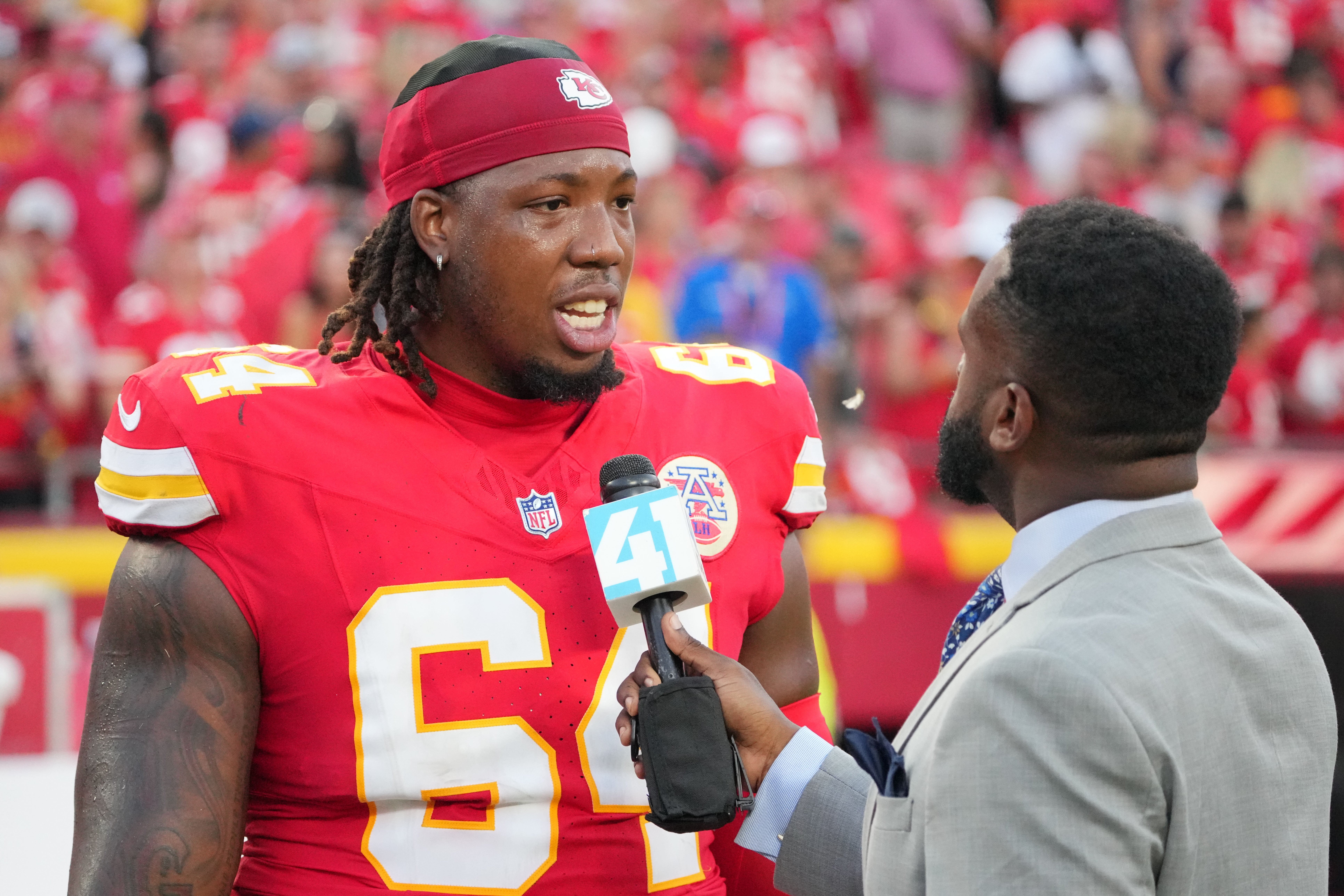 Sep 15, 2024; Kansas City, Missouri, USA; Kansas City Chiefs offensive tackle Wanya Morris (64) is interviewed after the win over the Cincinnati Bengals at GEHA Field at Arrowhead Stadium.