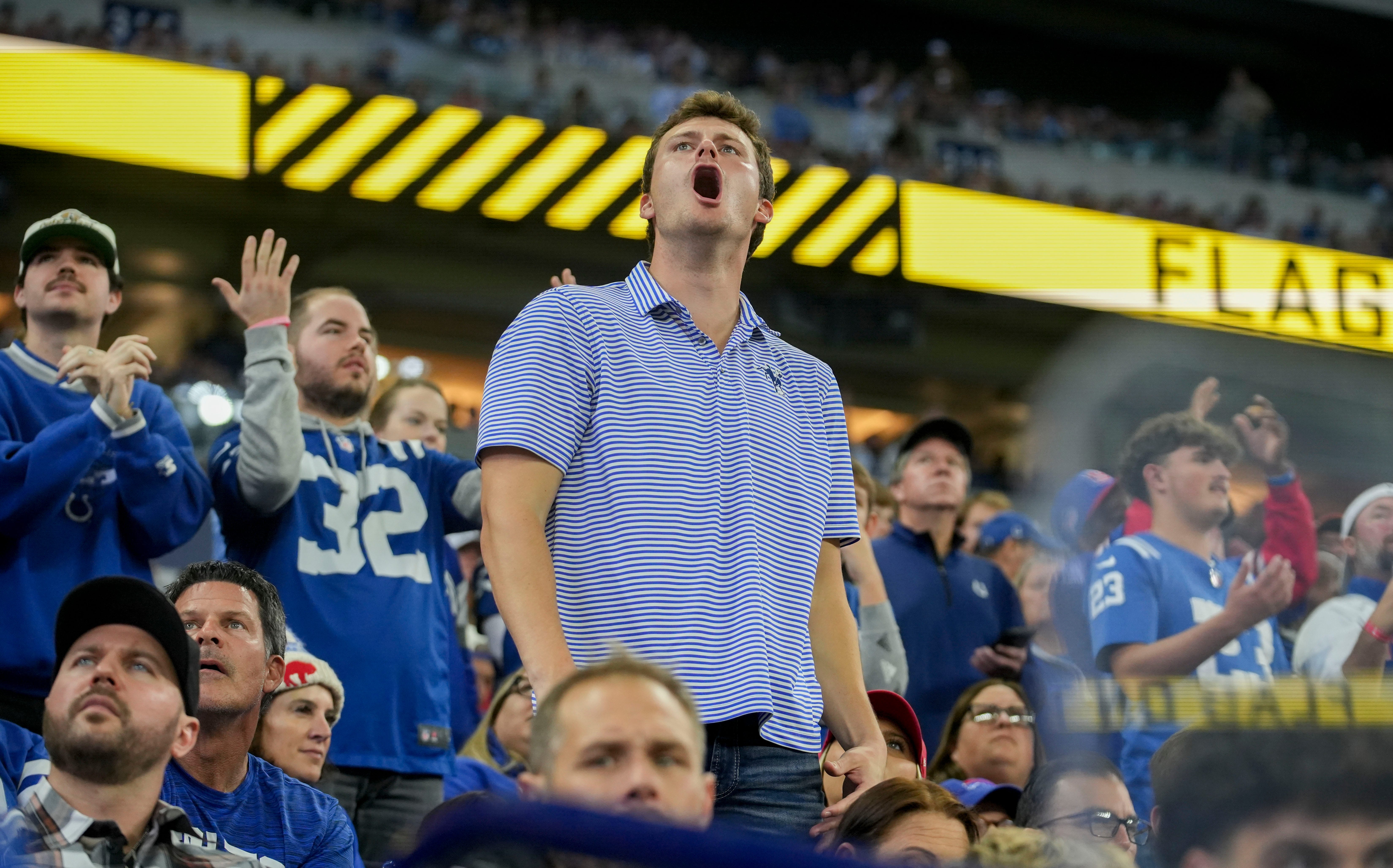 A Indianapolis Colts fan yells from the stands Sunday, Nov. 10, 2024, during a game against the Buffalo Bills at Lucas Oil Stadium in Indianapolis.
