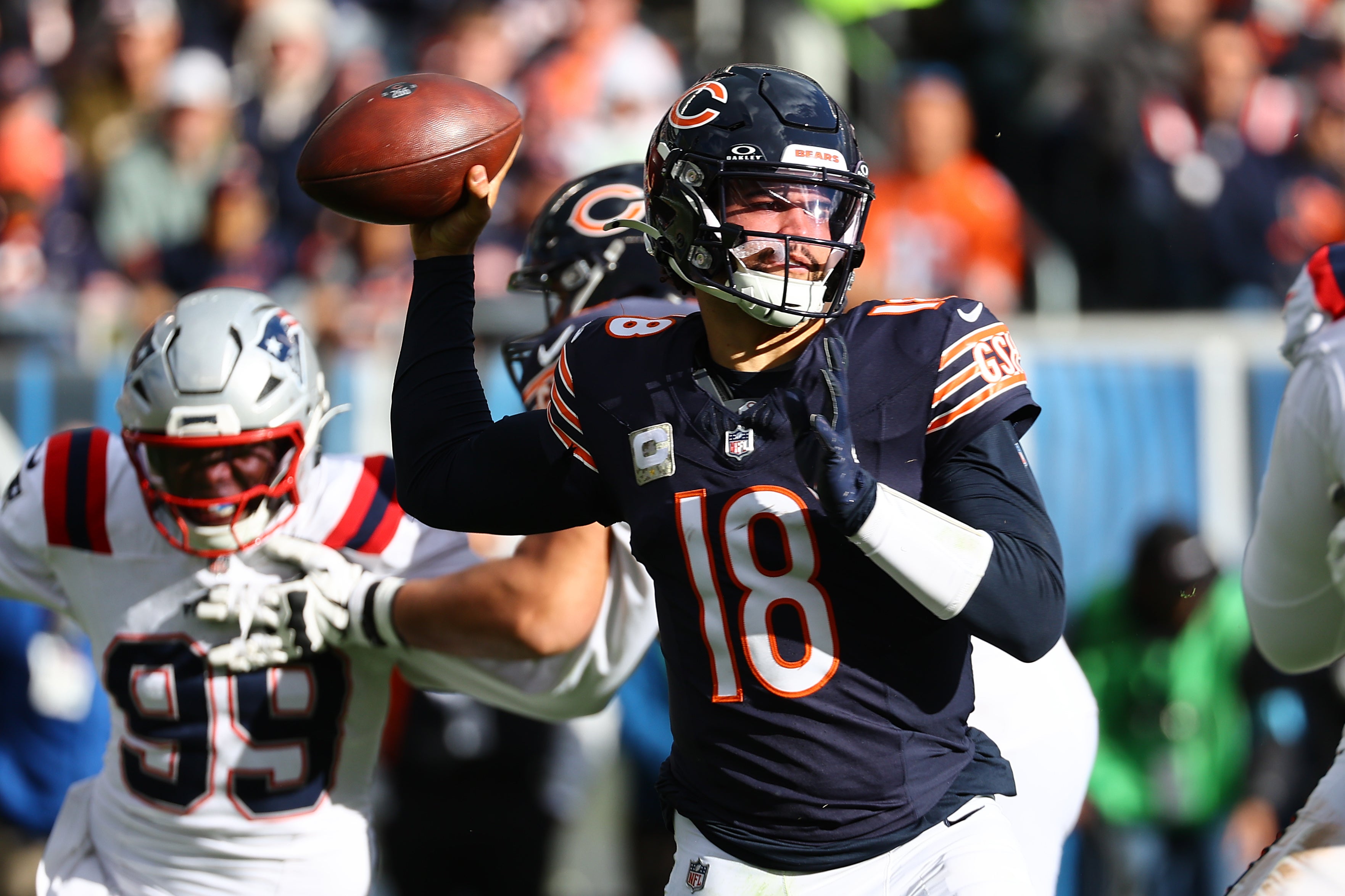Nov 10, 2024; Chicago, Illinois, USA; Chicago Bears quarterback Caleb Williams (18) drops back to pass against the New England Patriots during the second half at Soldier Field.