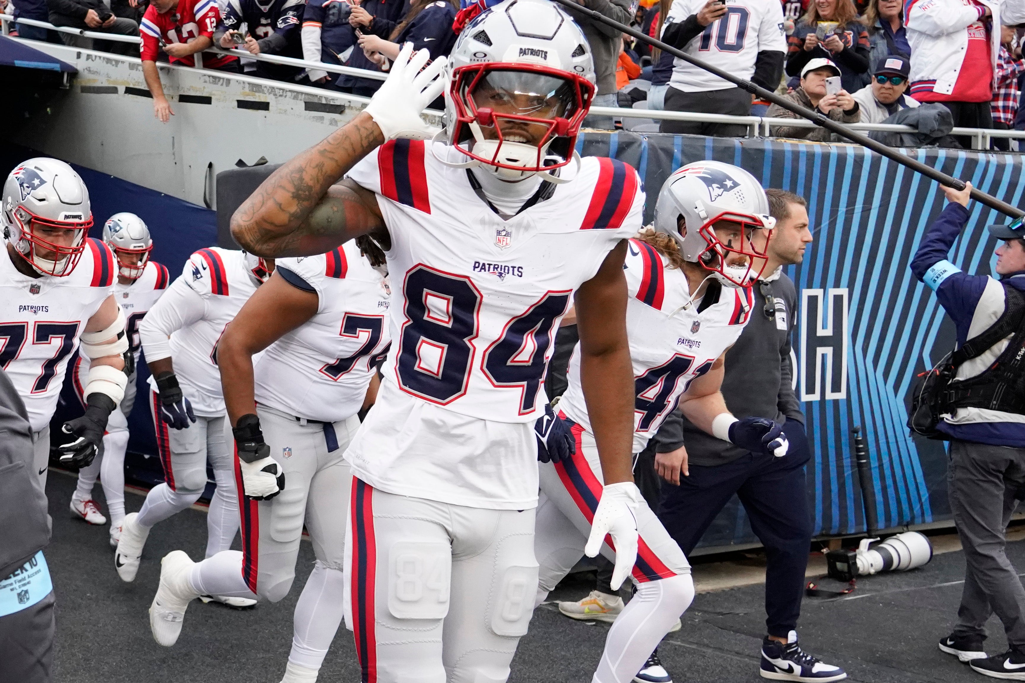 Nov 10, 2024; Chicago, Illinois, USA; New England Patriots wide receiver Kendrick Bourne (84) comes out of the tunnel against the Chicago Bears during the first half at Soldier Field.