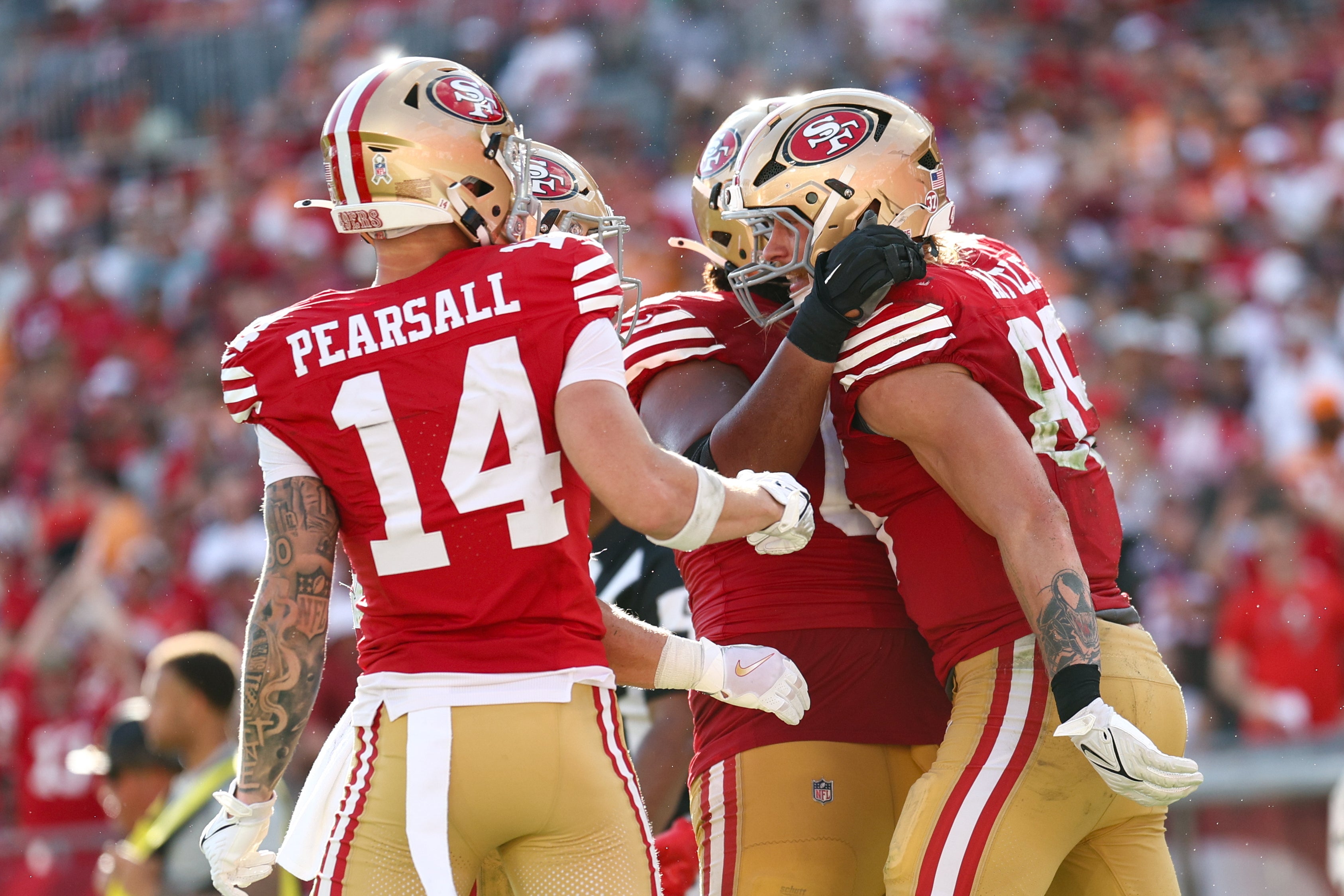 San Francisco 49ers tight end George Kittle (85) celebrates after scoring a touchdown against the Tampa Bay Buccaneers in the fourth quarter at Raymond James Stadium.