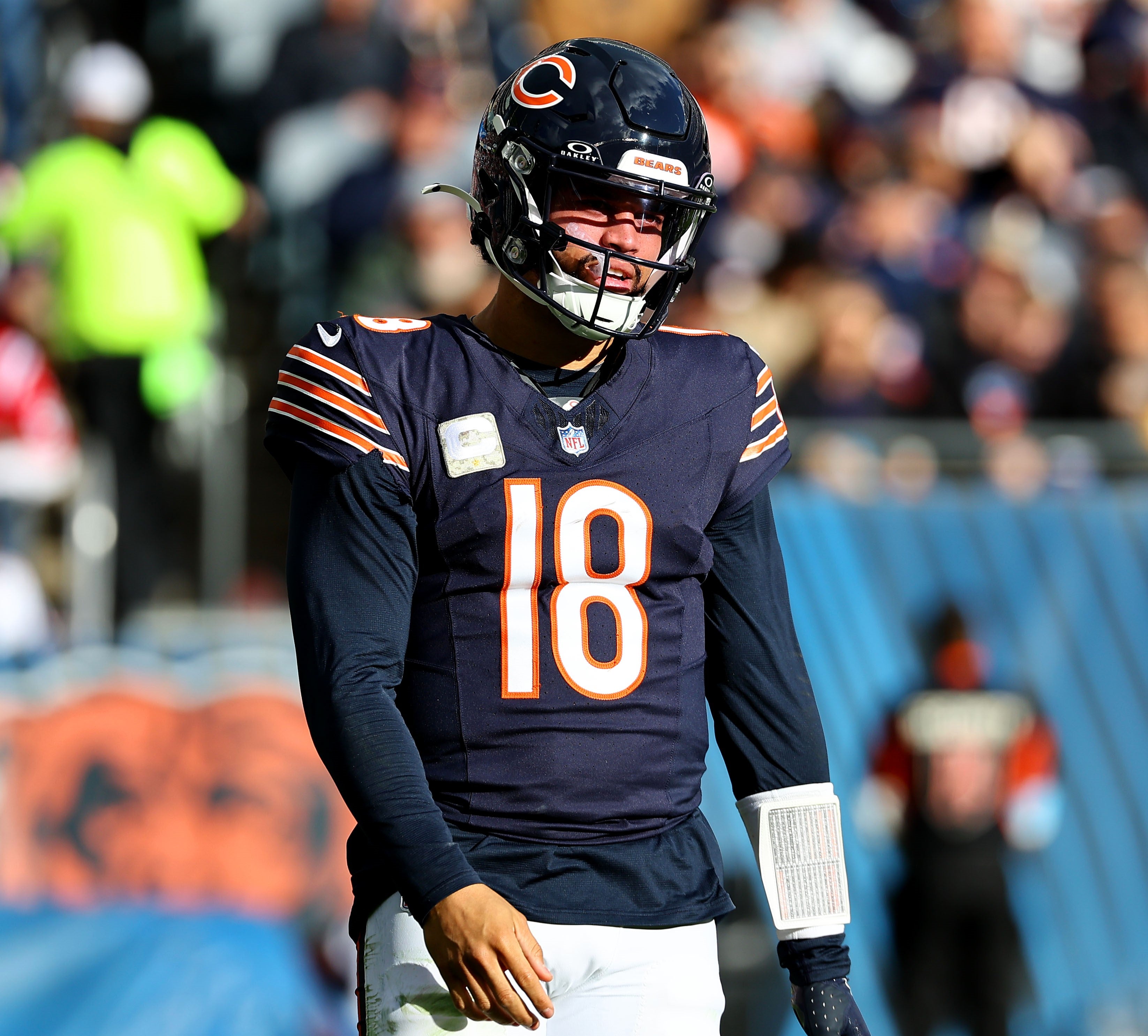 Nov 10, 2024; Chicago, Illinois, USA; Chicago Bears quarterback Caleb Williams (18) reacts after a pass against the New England Patriots during the second half at Soldier Field.