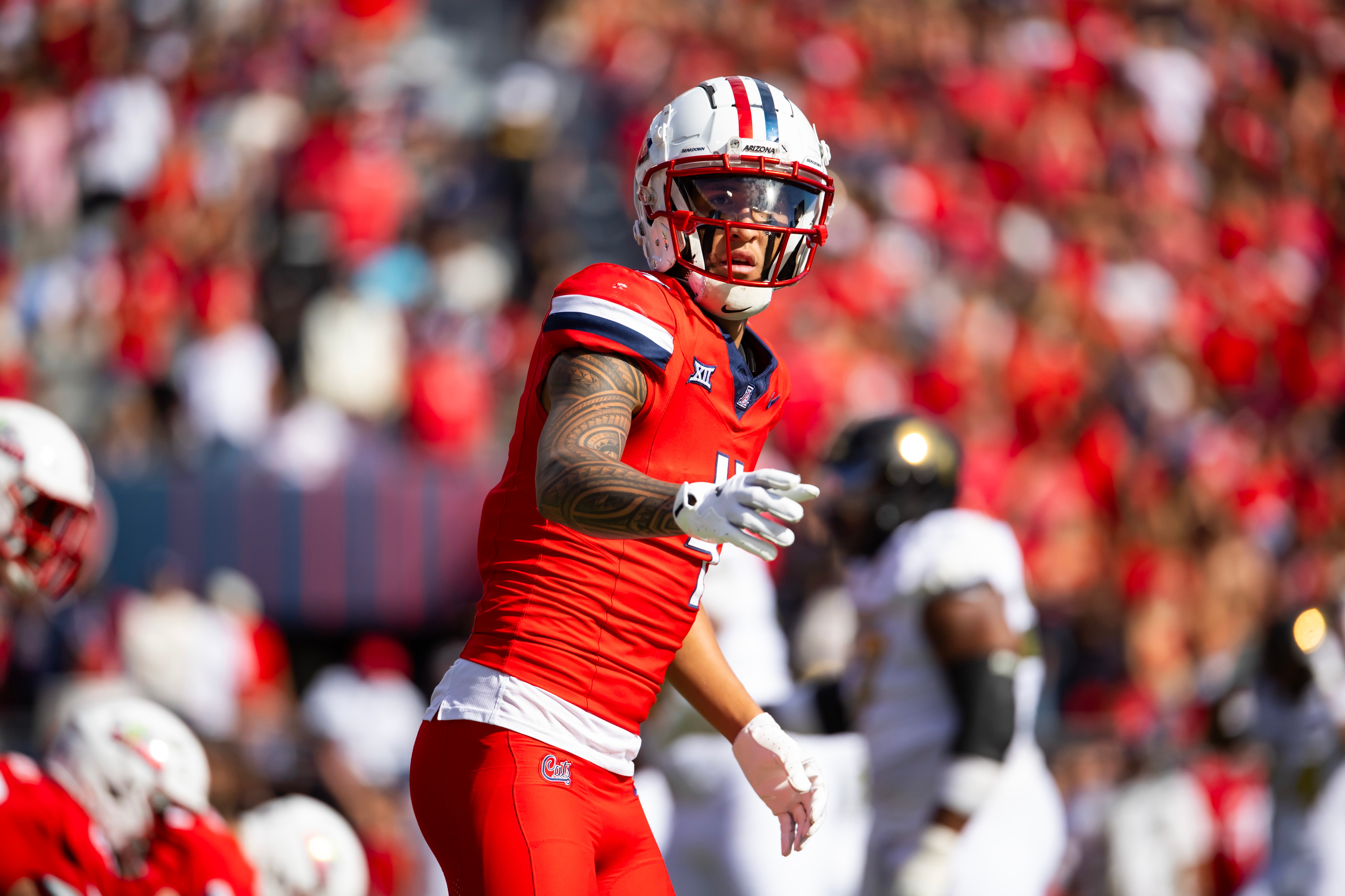 Arizona Wildcats wide receiver Tetairoa McMillan (4) against the Colorado Buffalos at Arizona Stadium.