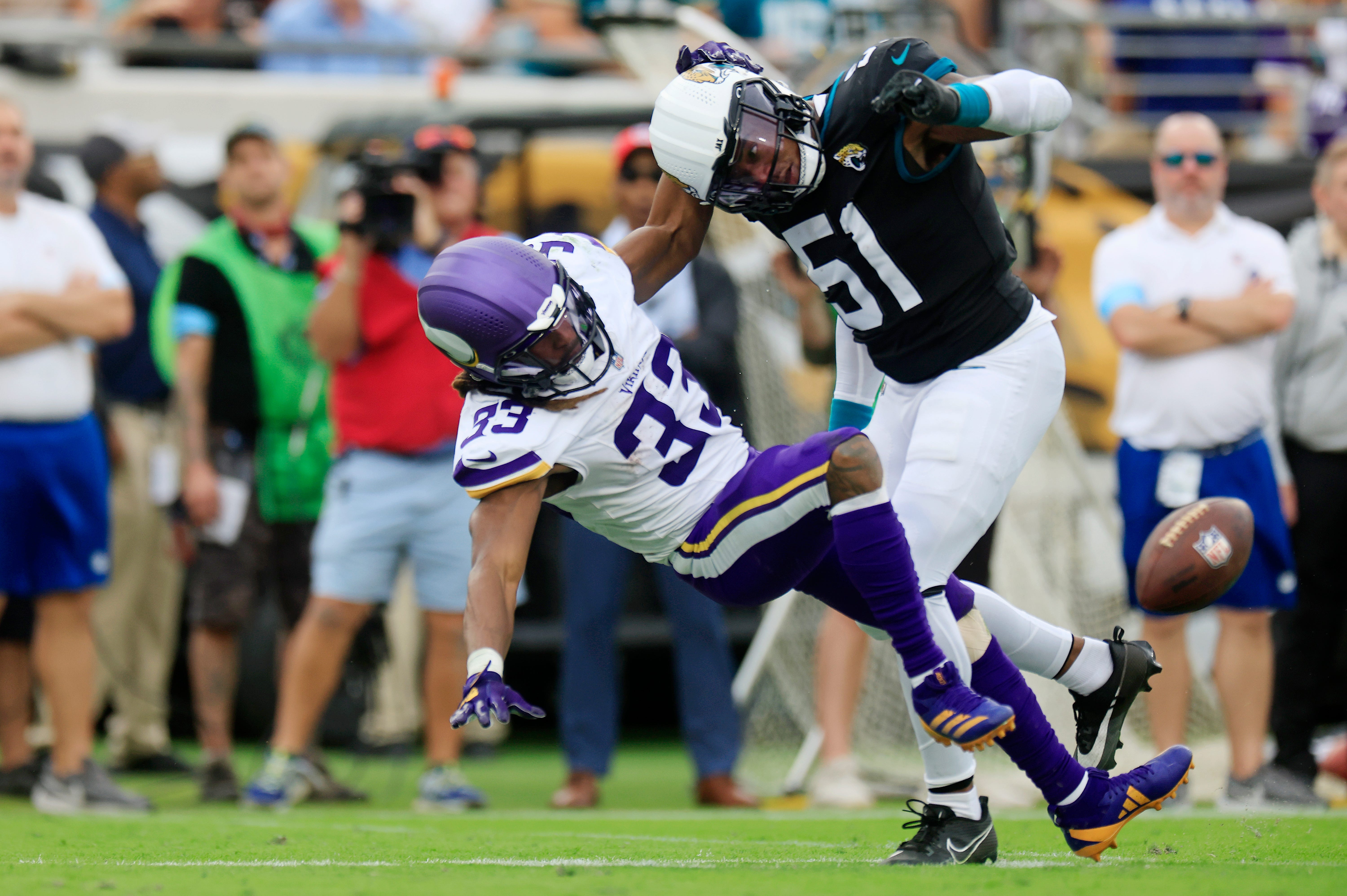 Jacksonville Jaguars linebacker Ventrell Miller (51) breaks up a pass intended for Minnesota Vikings running back Aaron Jones (33) during the second quarter an NFL football matchup Sunday, Nov. 10, 2024 at Everbank Stadium in Jacksonville, Fla. The Vikings defeated the Jaguars 12-7.