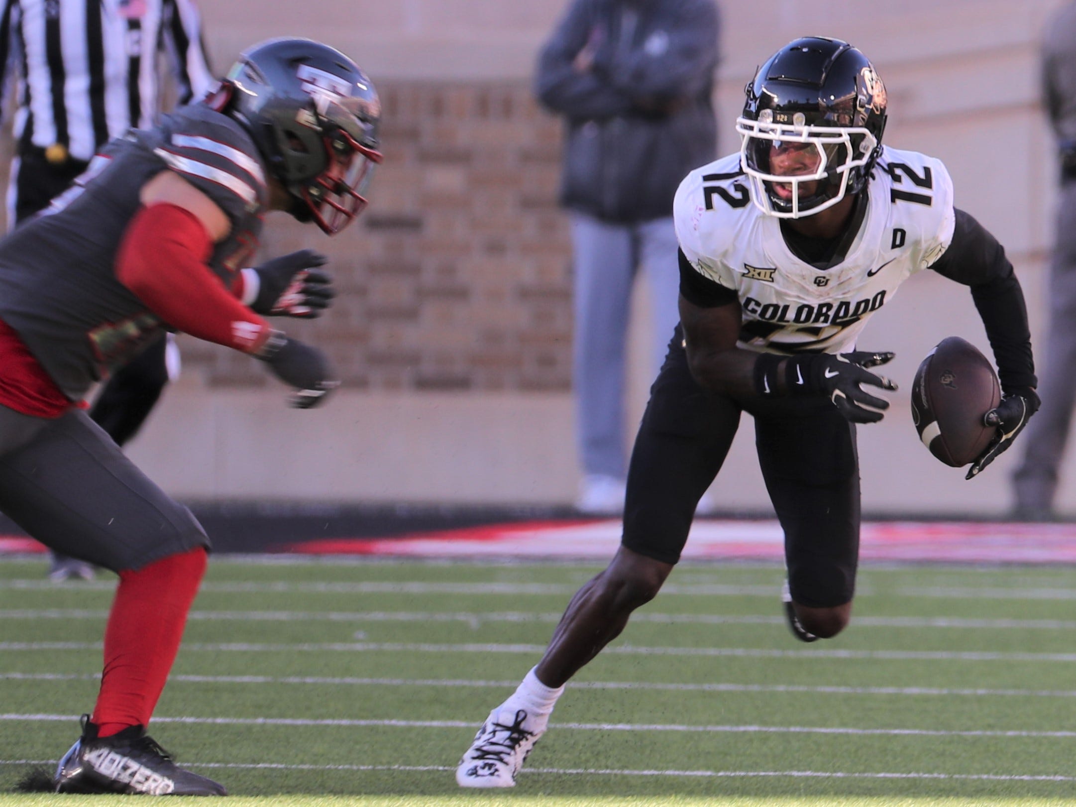 Colorado's Travis Hunter runs after a catch against Texas Tech in a Big 12 football game Saturday, Nov. 9, 2024, at Jones AT&T Stadium.