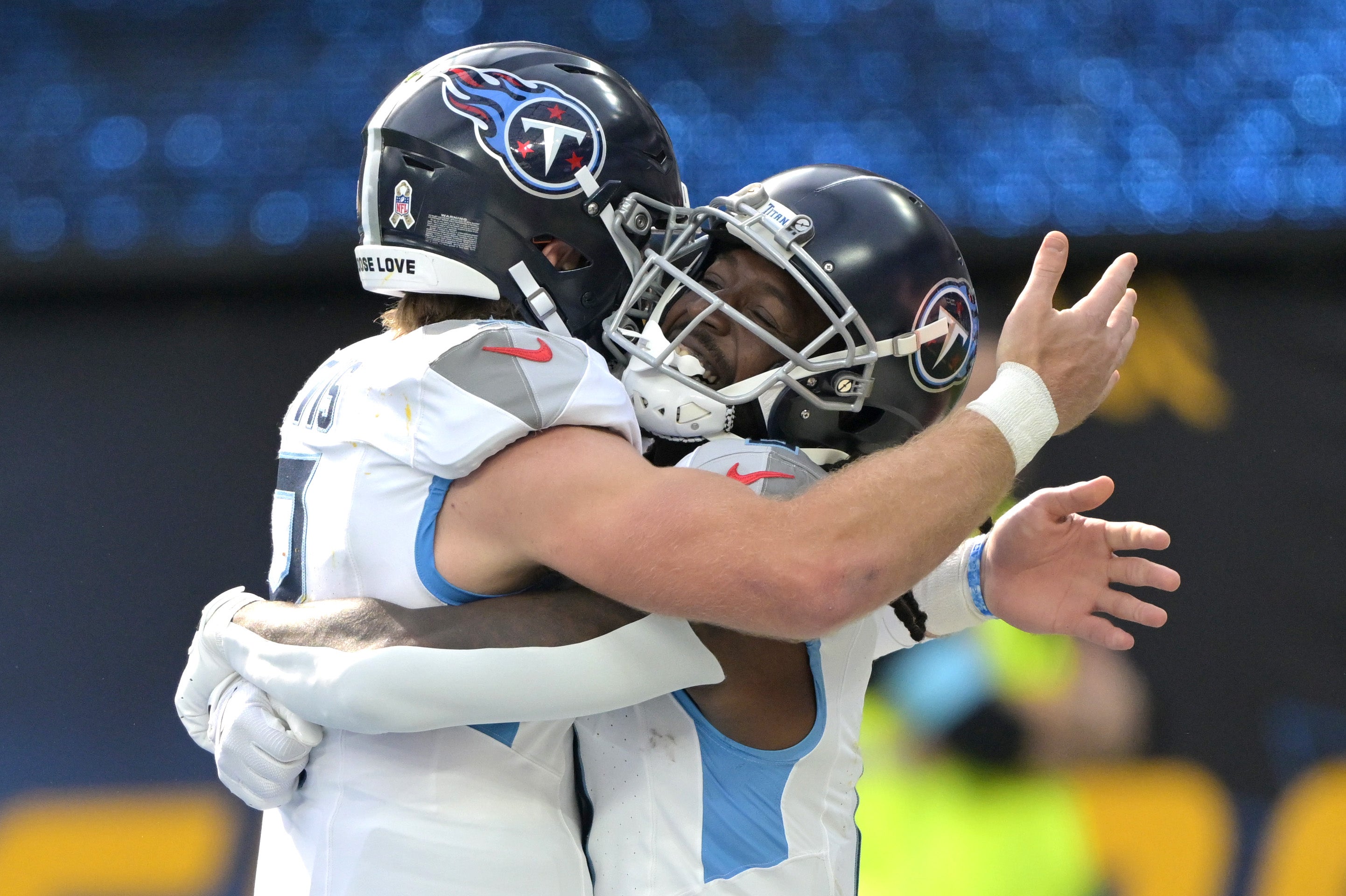 Tennessee Titans wide receiver Calvin Ridley (0) is congratulated by quarterback Will Levis (8) after scoring a touchdown in the first half against the Los Angeles Chargers at SoFi Stadium. Jayne Kamin-Oncea-Imagn Images