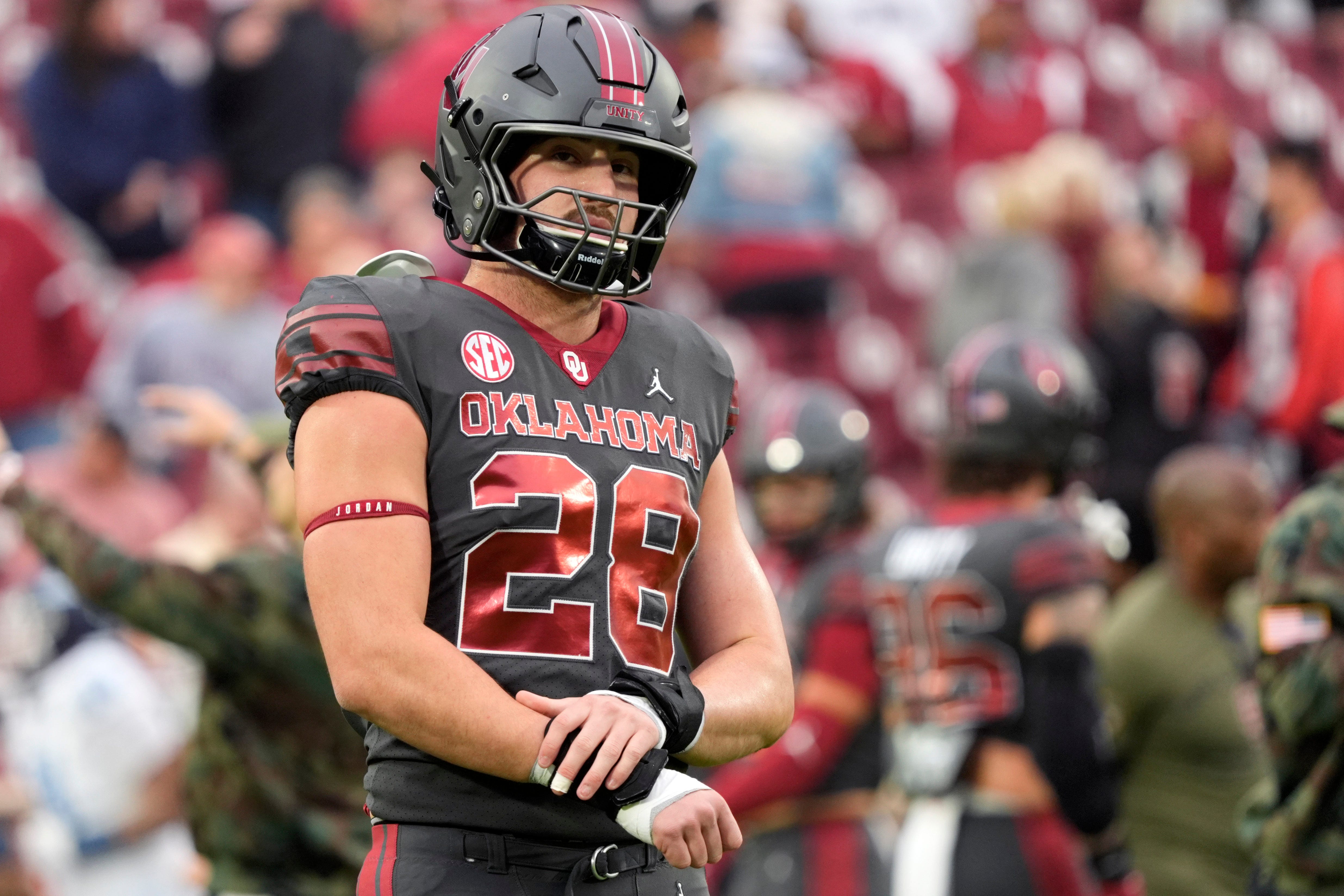 Oklahoma Sooners linebacker Danny Stutsman (28) warms up before a college football game between the University of Oklahoma Sooners (OU) and the Maine Black Bears at Gaylord Family - Oklahoma Memorial Stadium in Norman, Okla., Saturday, Nov. 2, 2024.