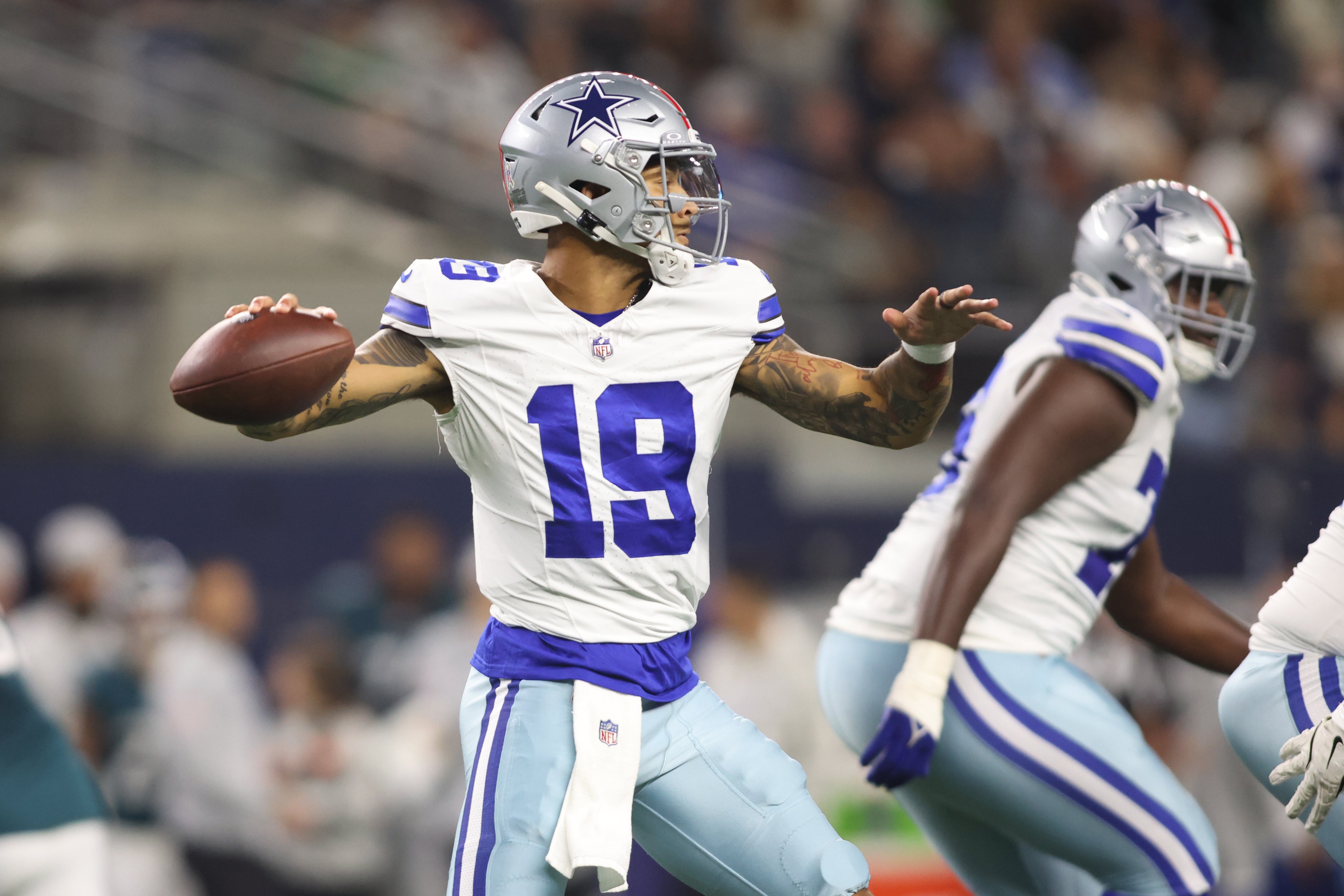 Dallas Cowboys quarterback Trey Lance (19) throws a pass against the Philadelphia Eagles in the fourth quarter at AT&T Stadium.