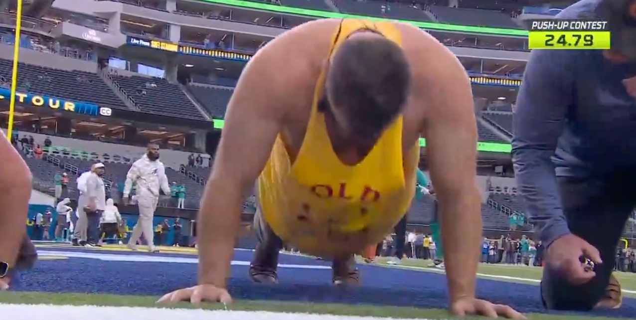 Jason Kelce competes in a push up contest on Monday Night Countdown against military veterans in honor of Veterans day