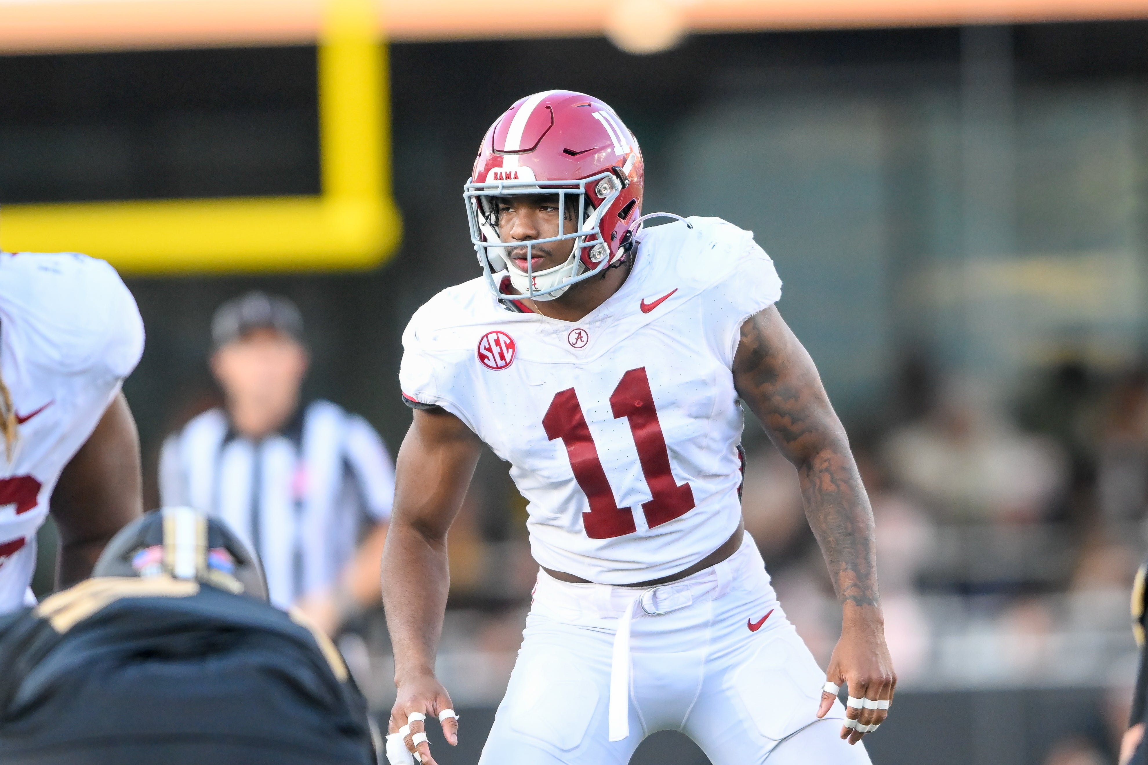 Oct 5, 2024; Nashville, Tennessee, USA; Alabama Crimson Tide linebacker Jihaad Campbell (11) sneaks a peek into the back field against the Vanderbilt Commodores during the second half at FirstBank Stadium.