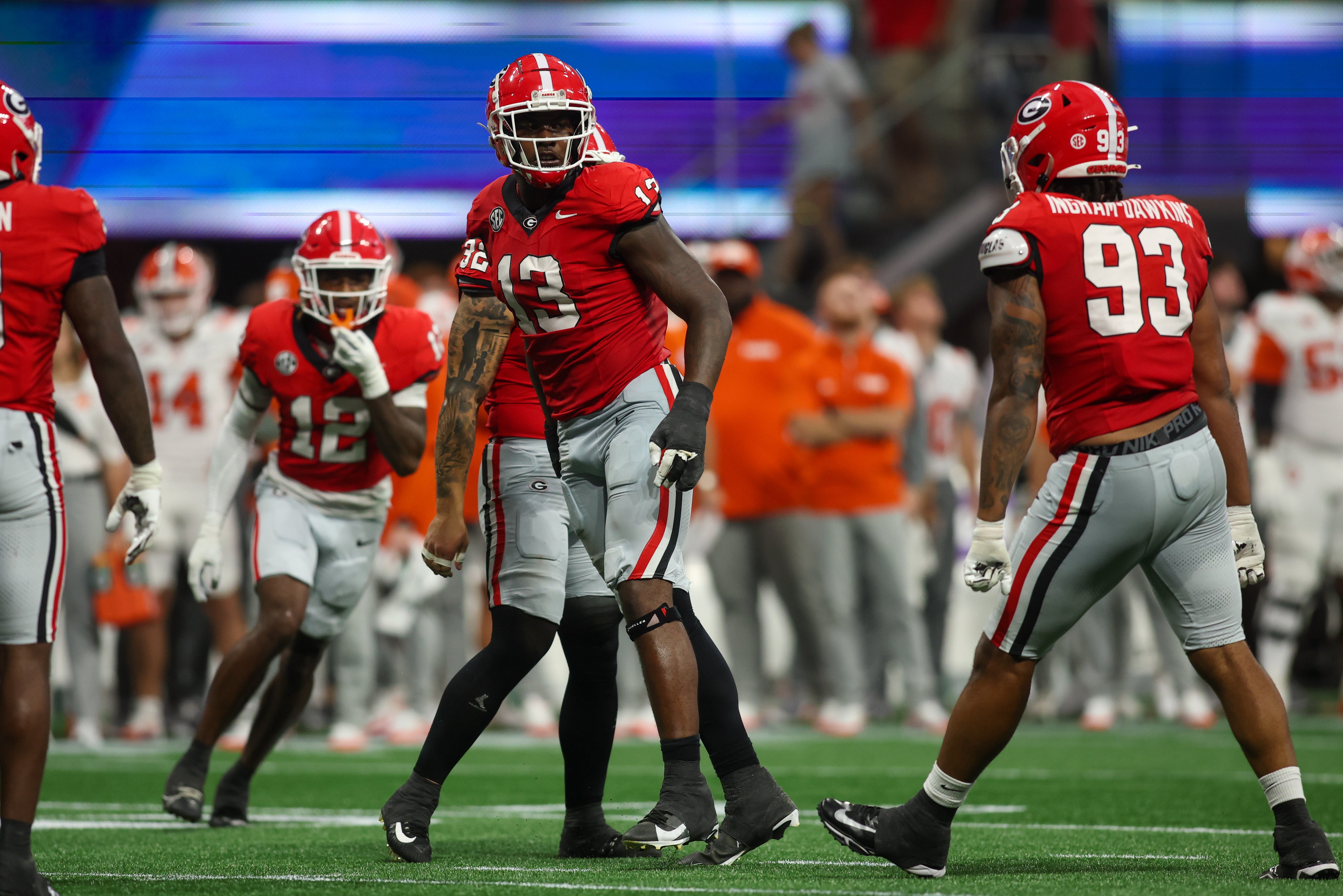 Aug 31, 2024; Atlanta, Georgia, USA; Georgia Bulldogs defensive lineman Mykel Williams (13) celebrates after a tackle against the Clemson Tigers in the third quarter at Mercedes-Benz Stadium.