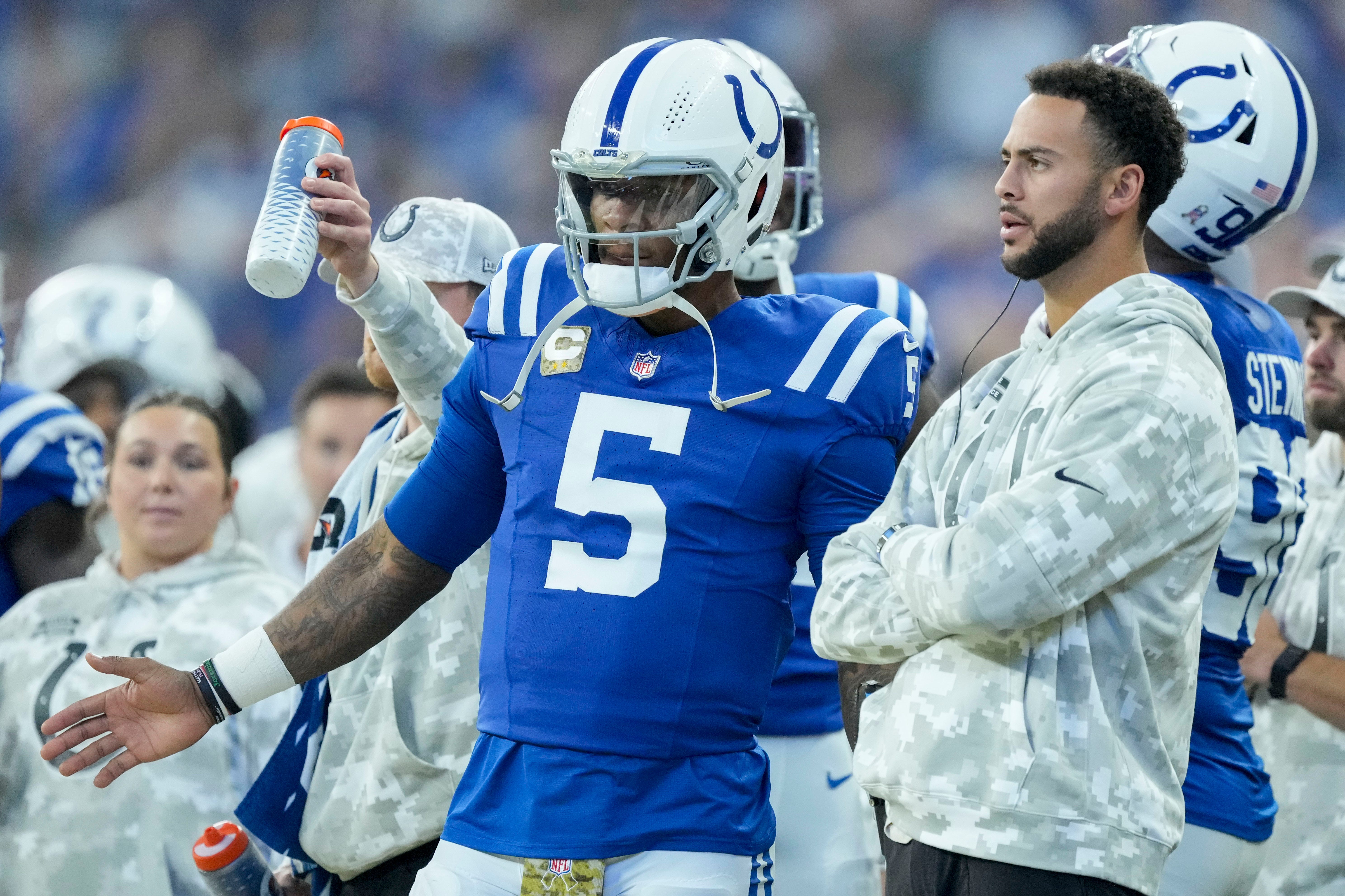 Indianapolis Colts quarterback Anthony Richardson (5) and Indianapolis Colts wide receiver Michael Pittman Jr. (11) watch the action on the field from the sideline Sunday, Nov. 10, 2024, during a game against the Buffalo Bills at Lucas Oil Stadium in Indianapolis.