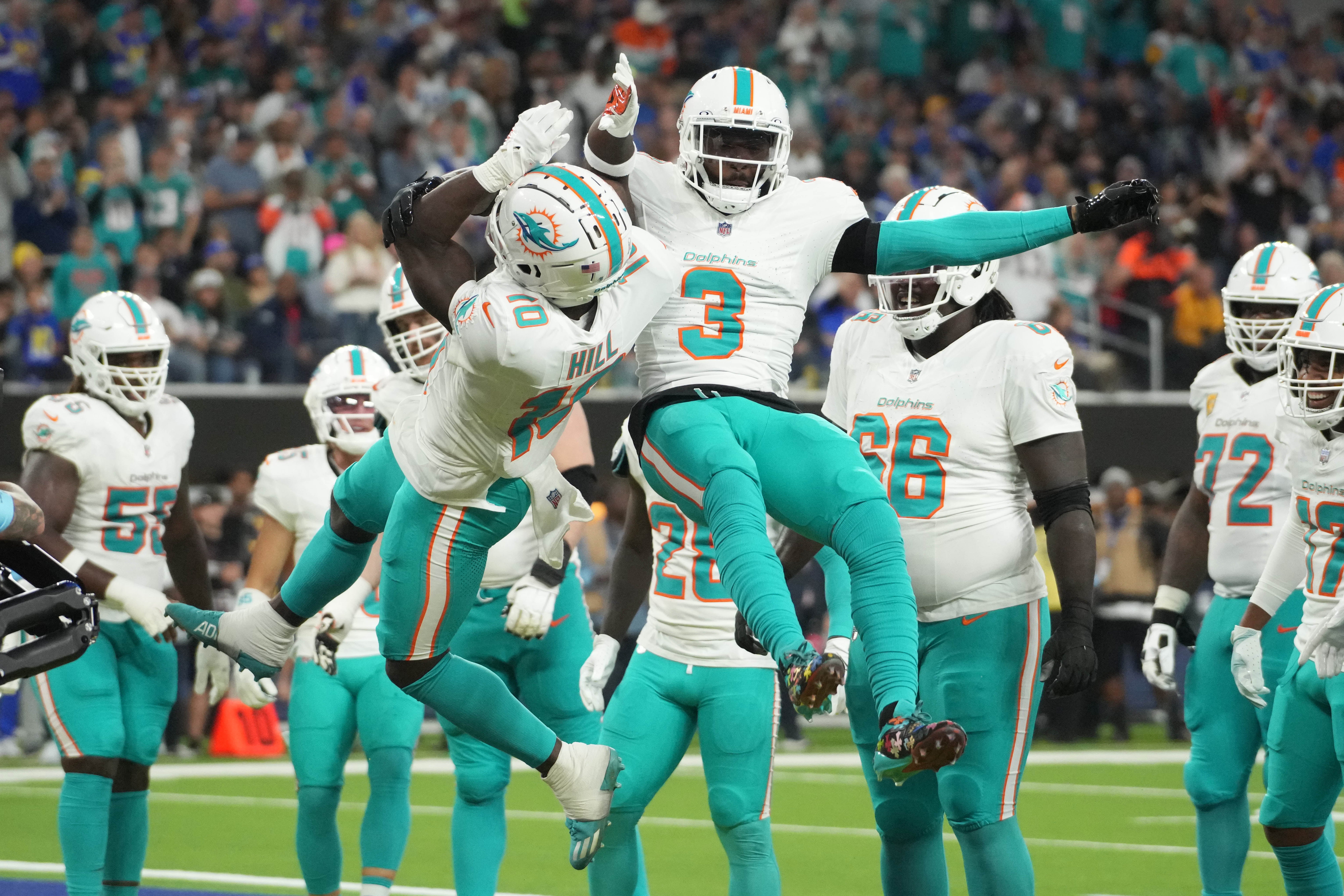 Nov 11, 2024; Inglewood, California, USA; Miami Dolphins wide receiver Tyreek Hill (10) celebrates with wide receiver Odell Beckham Jr. (3) after scoring on a 1-yard touchdown reception against the Los Angeles Rams in the second half at SoFi Stadium.