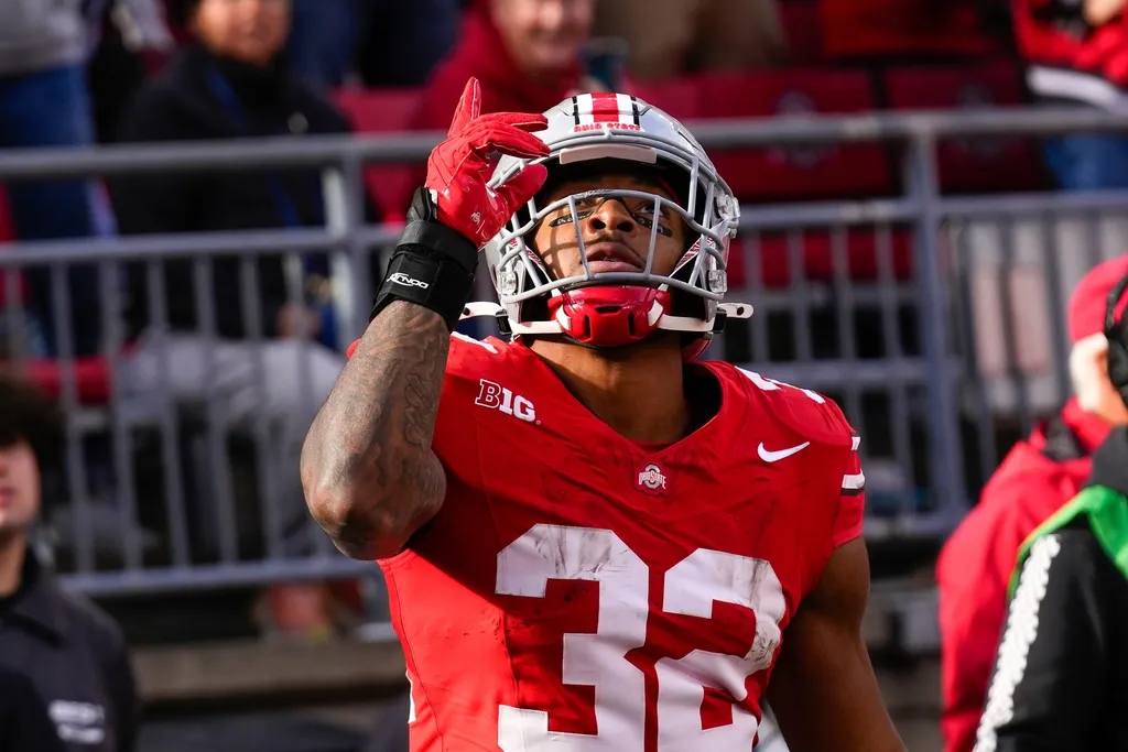 Ohio State Buckeyes running back TreVeyon Henderson (32) celebrates after scoring a touchdown in the second half at Ohio Stadium on Saturday, Nov. 9, 2024 in Columbus, Ohio