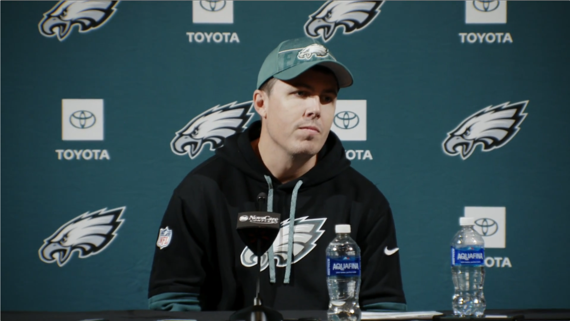 Philadelphia Eagles offensive coordinator Kellen Moore talks to reporters about Dallas Cowboys' AT&T Stadium and sunlight.