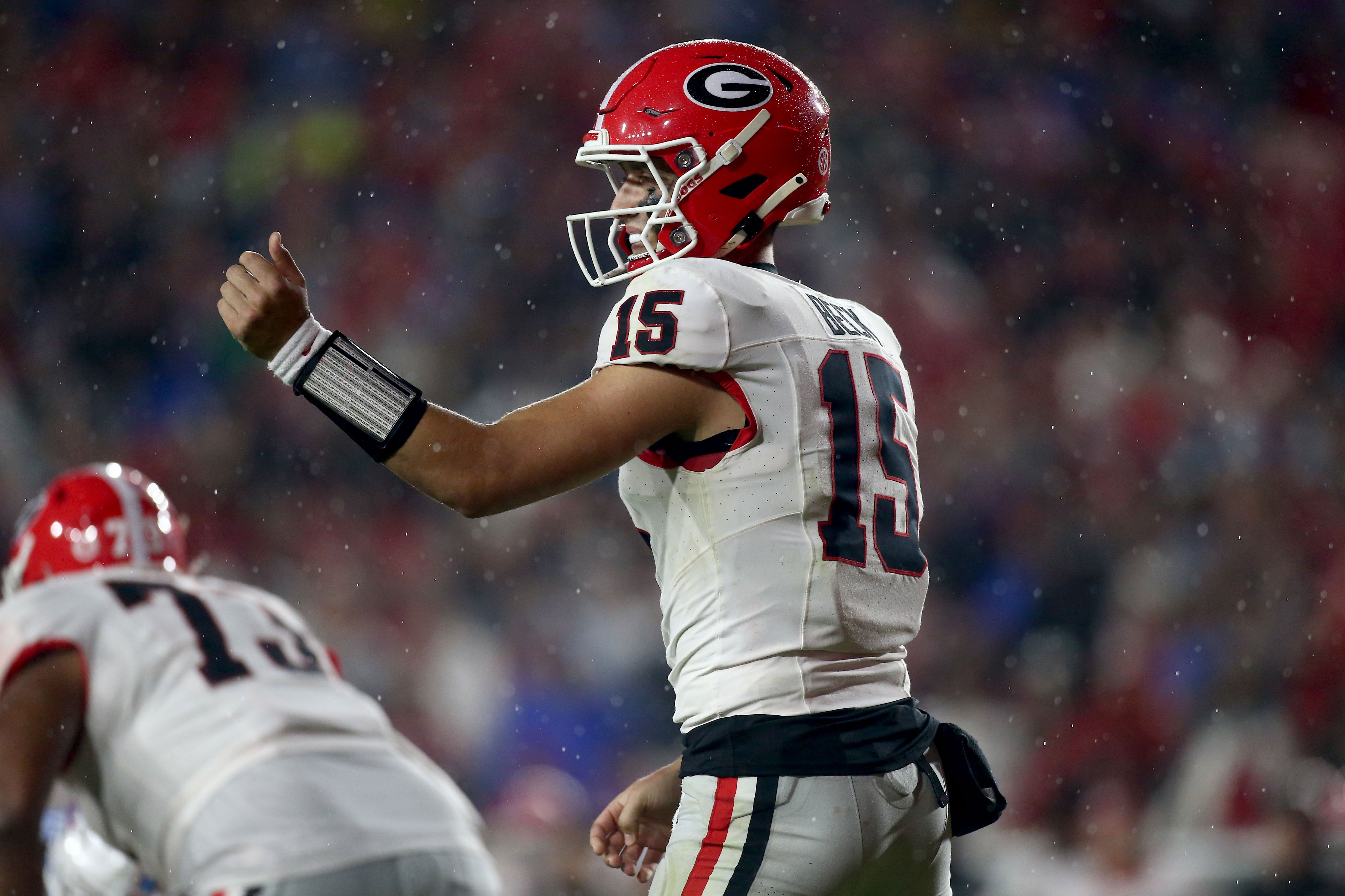 Nov 9, 2024; Oxford, Mississippi, USA; Georgia Bulldogs quarterback Carson Beck (15) gives direction prior to the snap during the second half against the Mississippi Rebels at Vaught-Hemingway Stadium.
