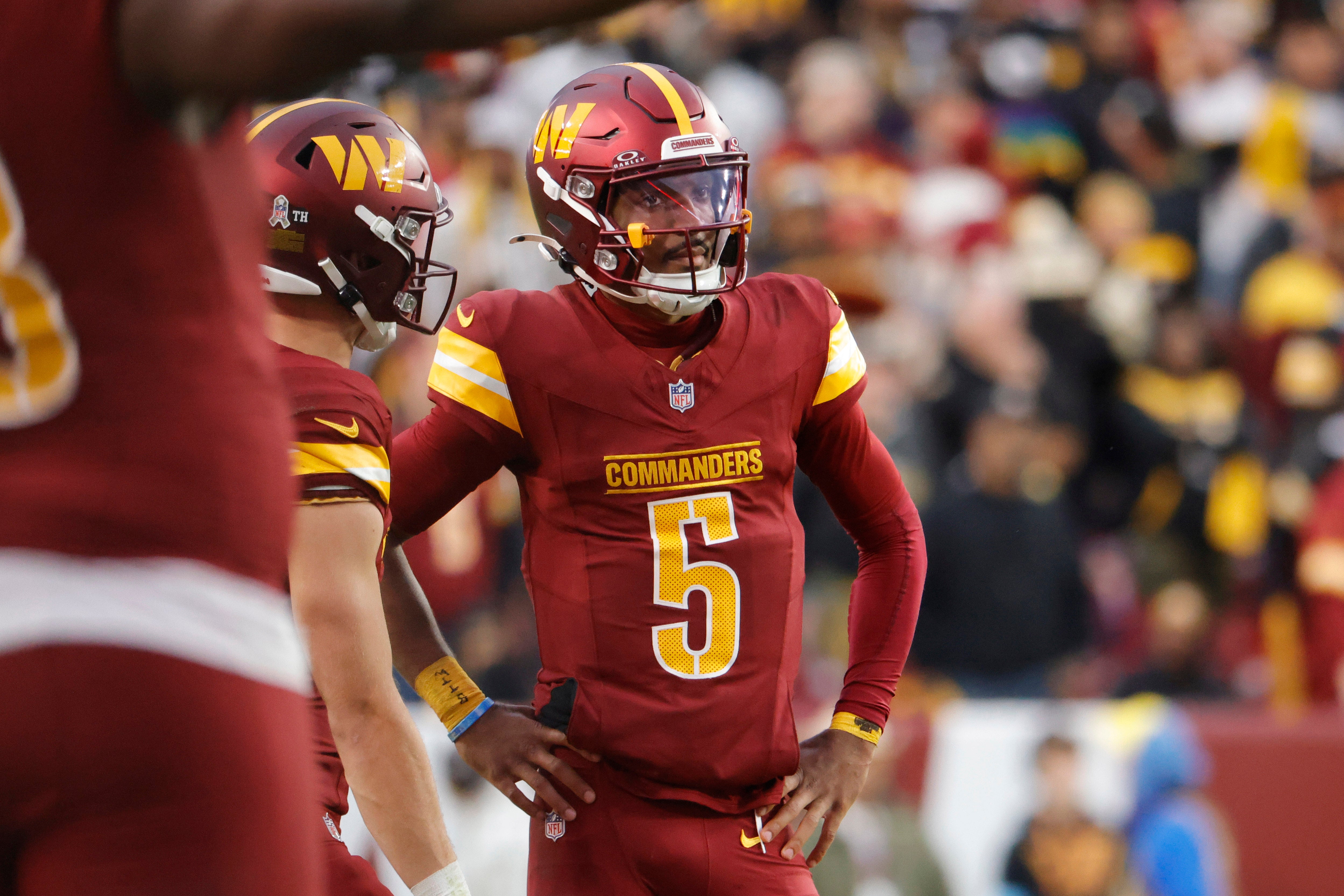 Nov 10, 2024; Landover, Maryland, USA; Washington Commanders quarterback Jayden Daniels (5) looks on from the field during final minutes of the game against the Pittsburgh Steelers at Northwest Stadium.