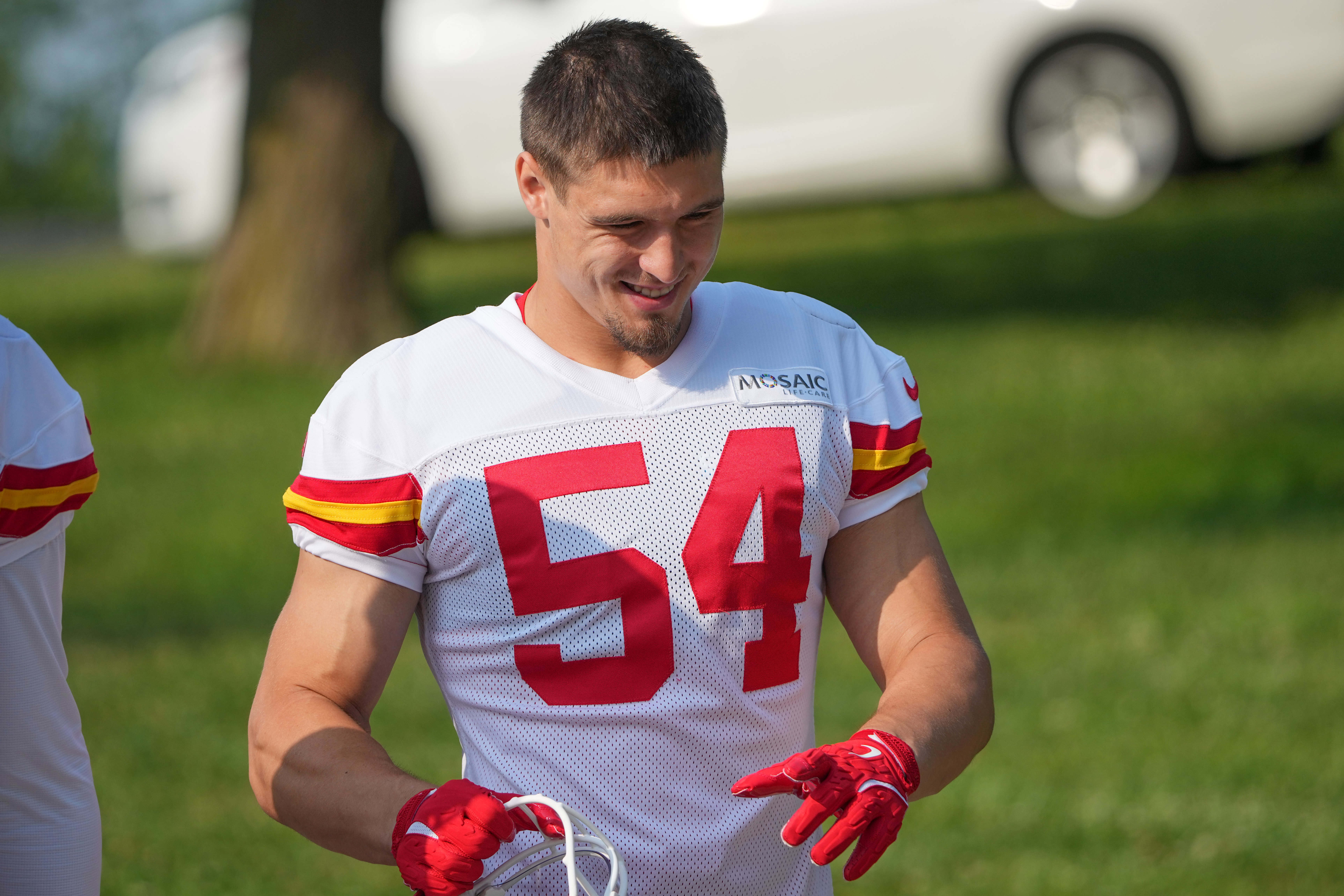Jul 22, 2024; St. Joseph, MO, USA; Kansas City Chiefs linebacker Leo Chenal (54) walks down the hill from the locker room to the fields prior to training camp at Missouri Western State University.