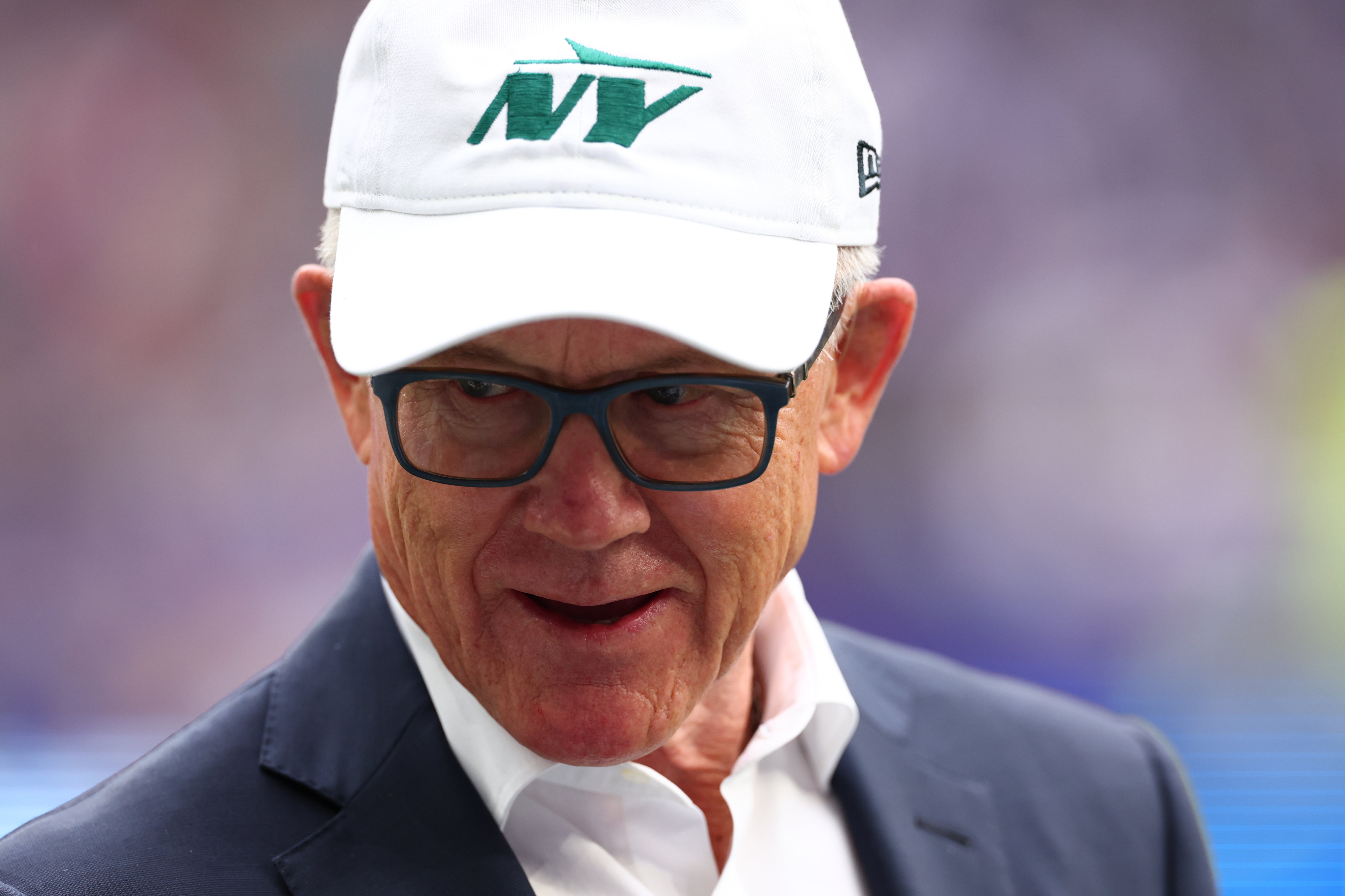 New York Jets owner Woody Johnson is pitch side before kick off against the Minnesota Vikings at Tottenham Hotspur Stadium.