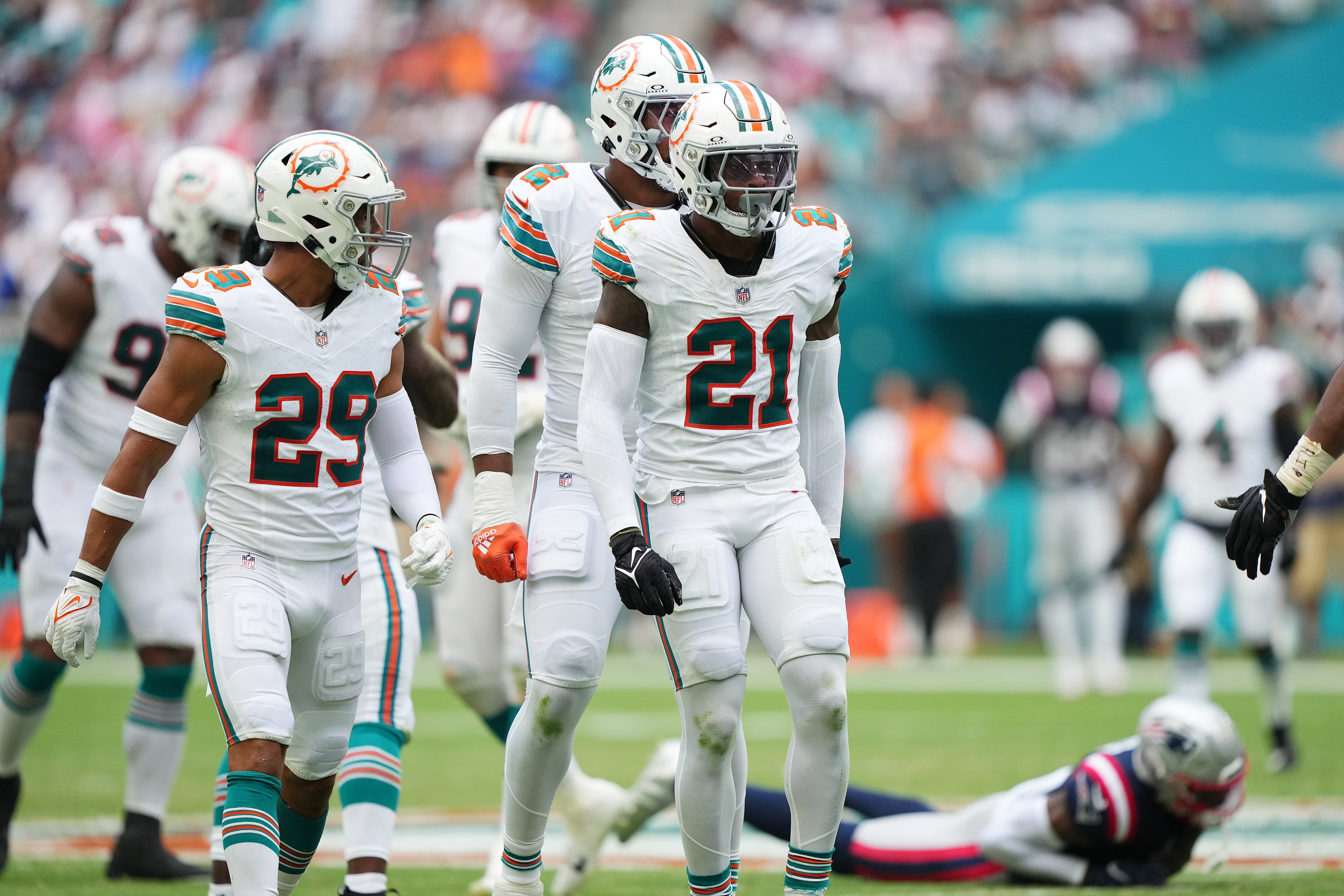Oct 29, 2023; Miami Gardens, Florida, USA; Miami Dolphins safety DeShon Elliott (21) celebrates after bringing down New England Patriots wide receiver DeVante Parker (1) during the second half at Hard Rock Stadium.
