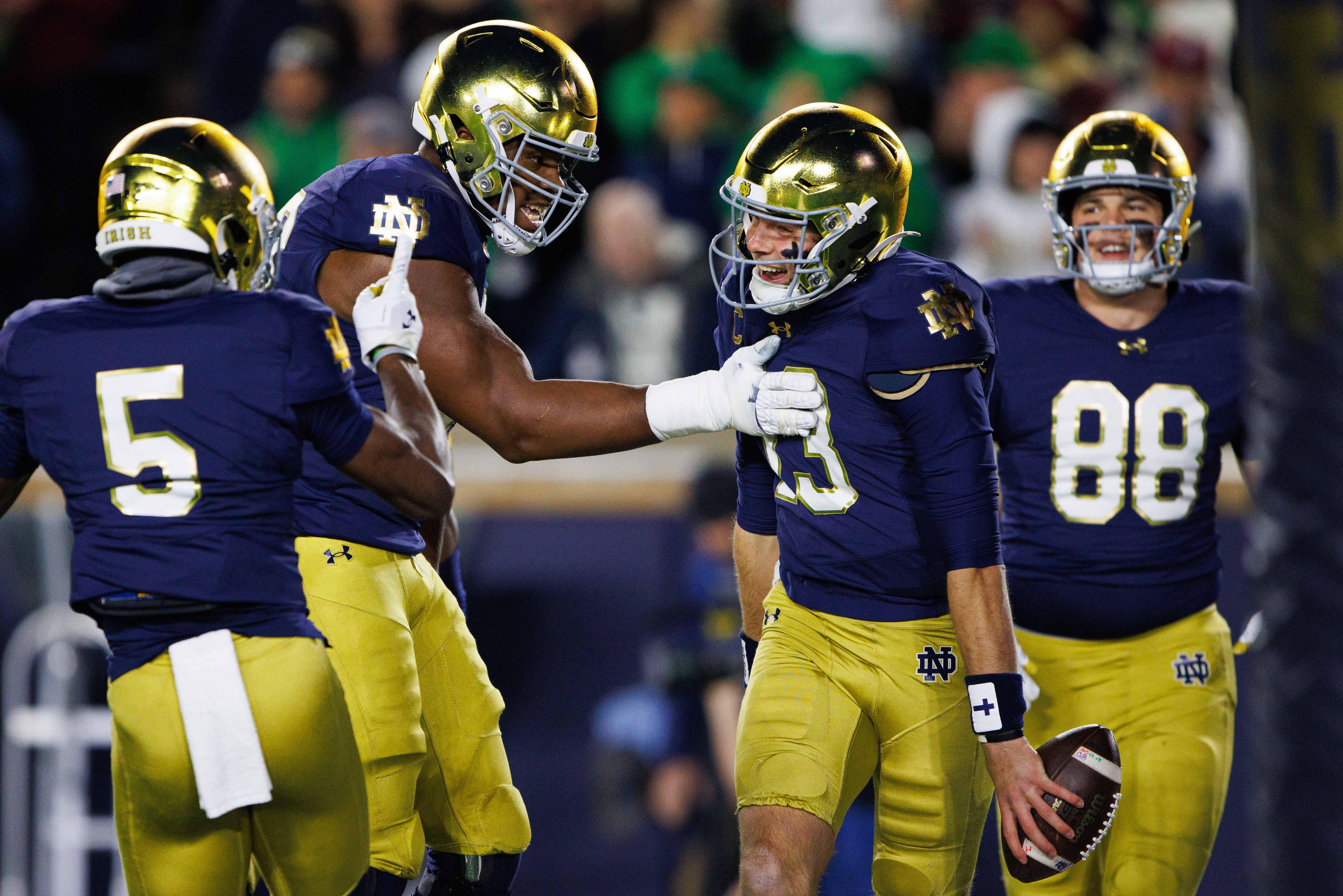 Notre Dame quarterback Riley Leonard (13) celebrates scoring a touchdown during a NCAA college football game against Florida State at Notre Dame Stadium on Saturday, Nov. 9, 2024, in South Bend.