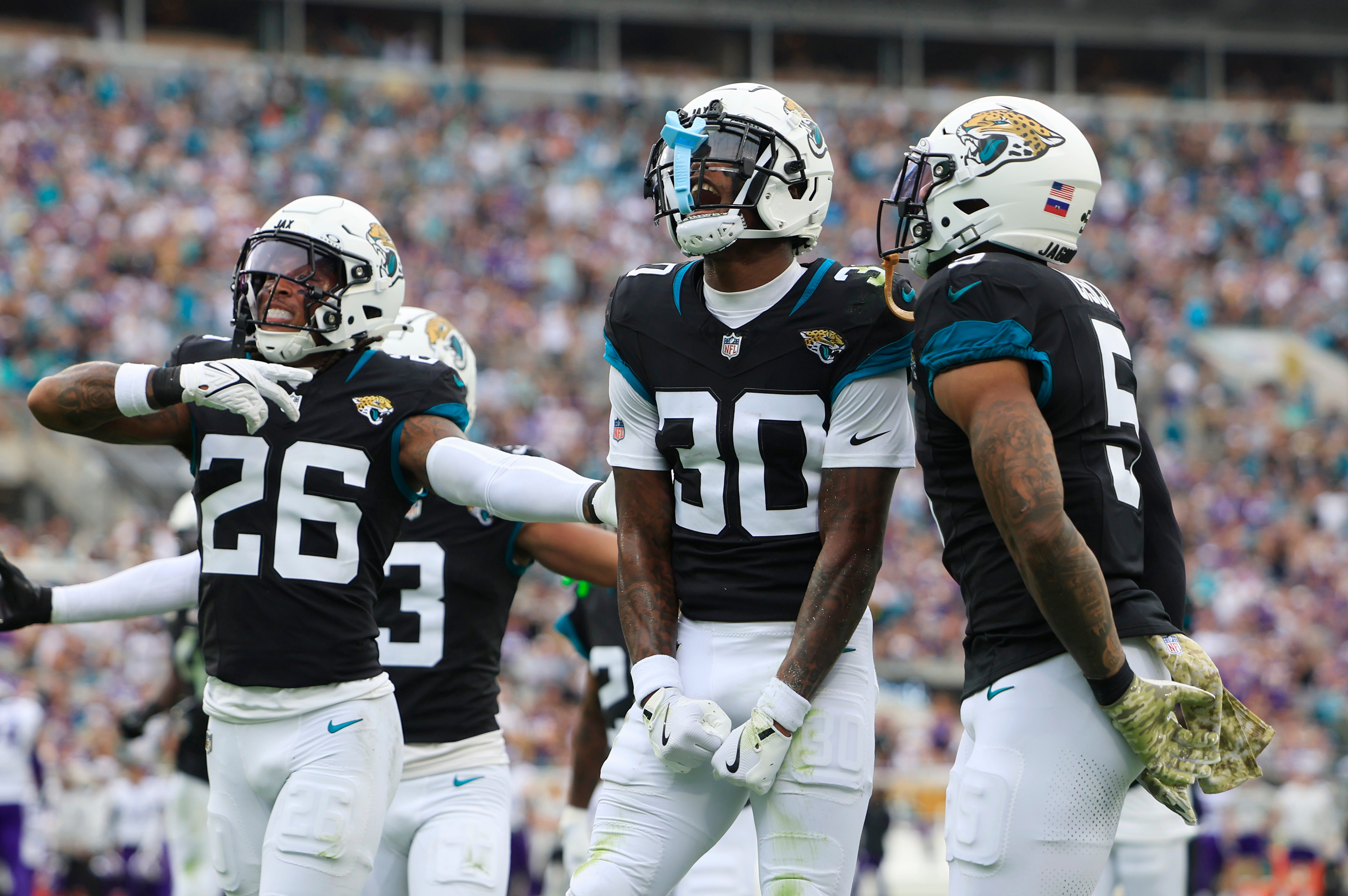 Jacksonville Jaguars cornerback Montaric Brown (30) celebrates his interception during the second quarter an NFL football matchup Sunday, Nov. 10, 2024 at Everbank Stadium in Jacksonville, Fla.