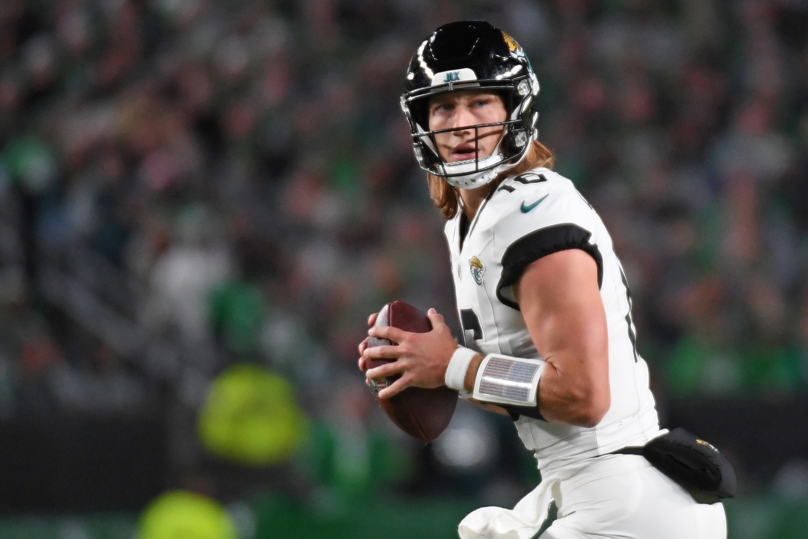 Nov 3, 2024; Philadelphia, Pennsylvania, USA; Jacksonville Jaguars quarterback Trevor Lawrence (16) looks for receiver against the Philadelphia Eagles during the third quarter at Lincoln Financial Field.