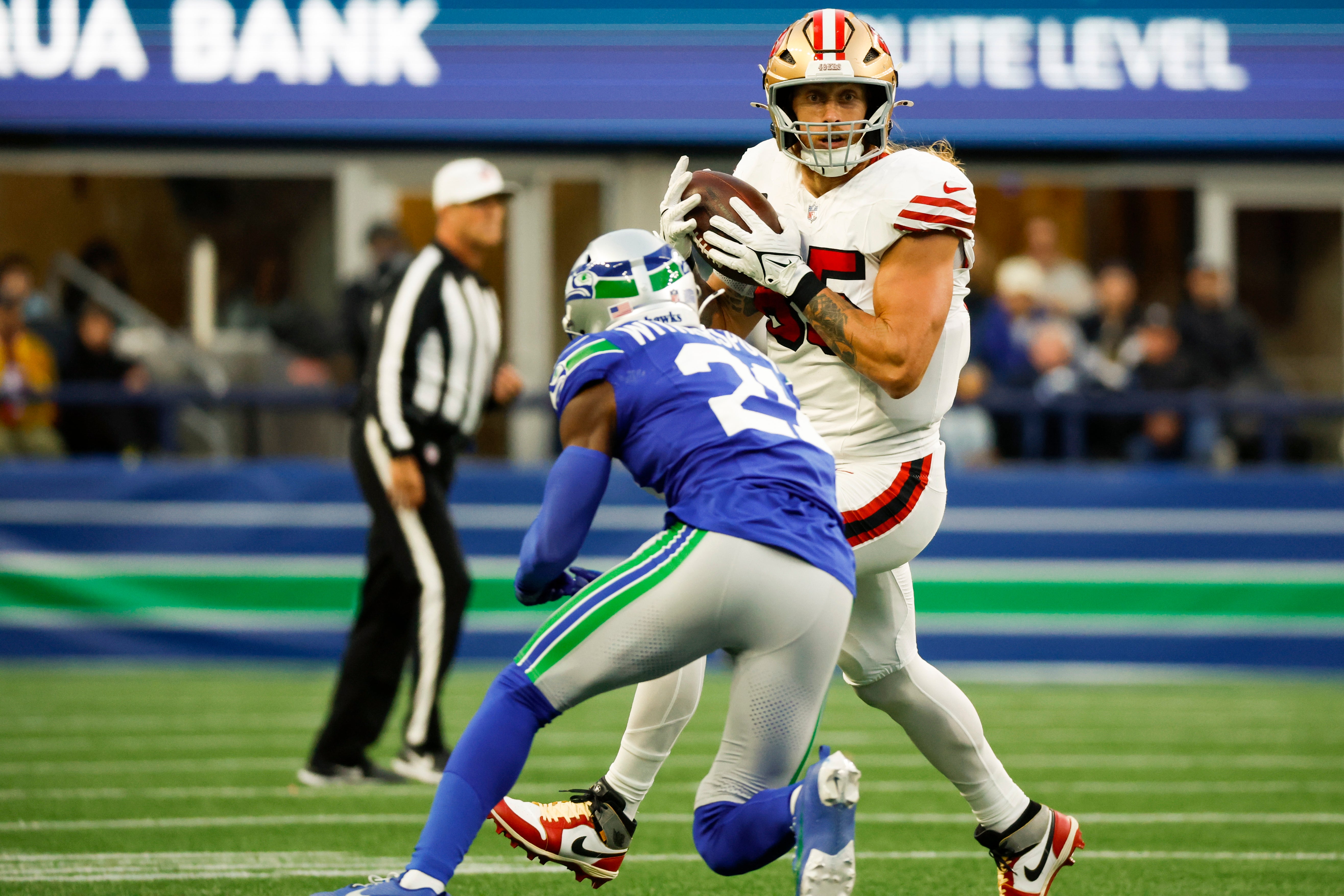 San Francisco 49ers tight end George Kittle (85) catches a pass against the Seattle Seahawks during the second quarter at Lumen Field.