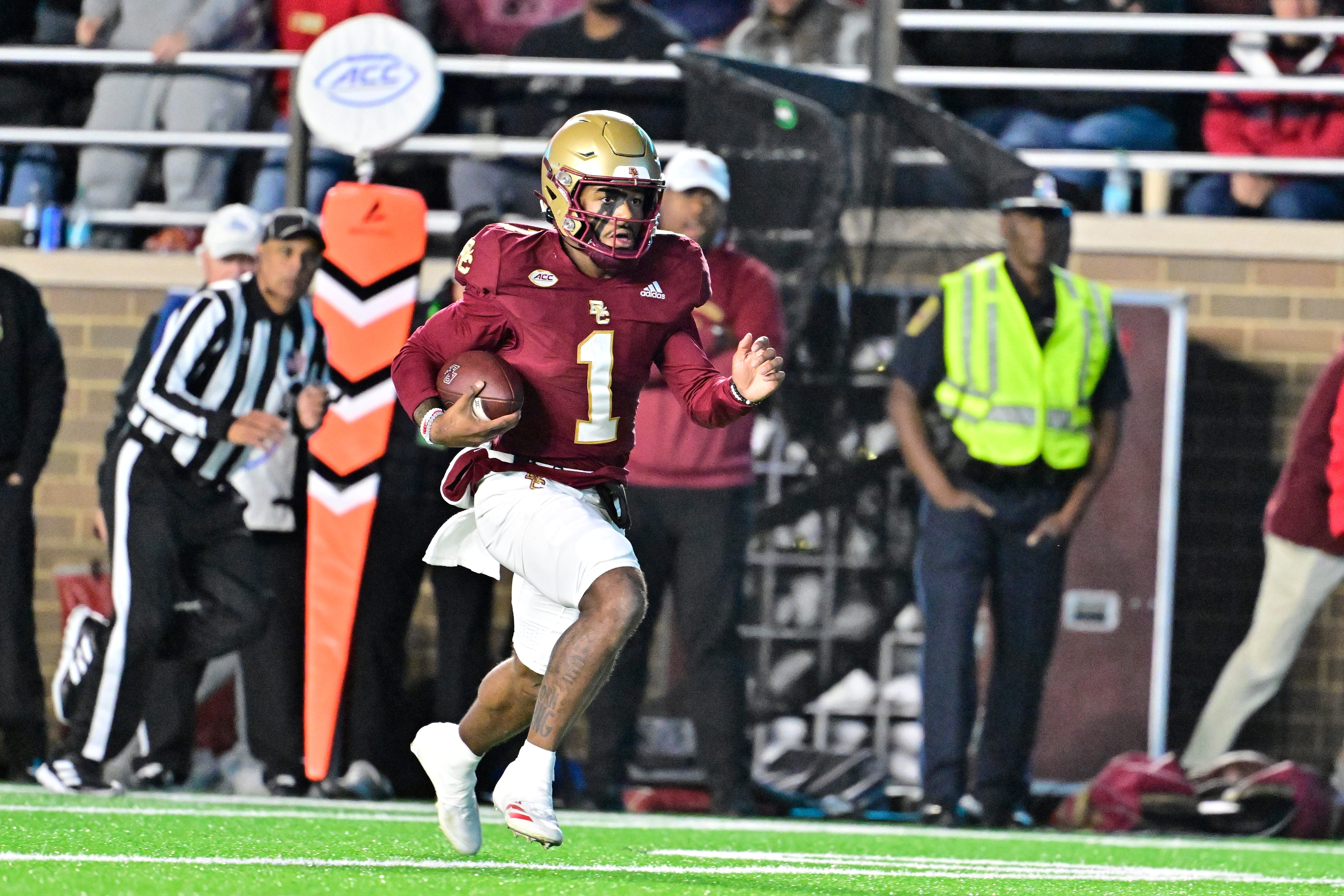 Boston College Eagles quarterback Thomas Castellanos (1) runs the ball against the Louisville Cardinals during the first half at Alumni Stadium. 