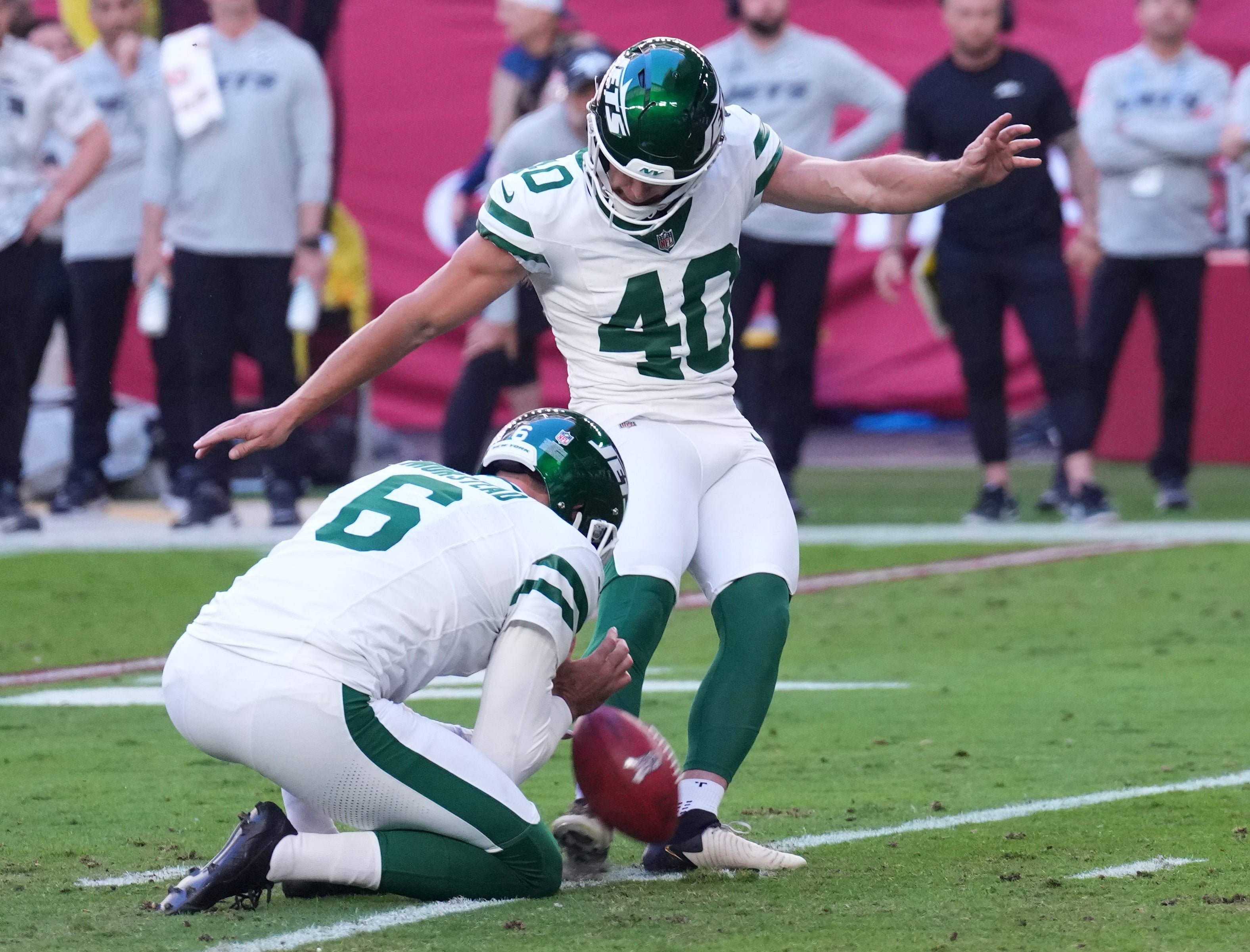 New York Jets place kicker Spencer Shrader (40) kicks a field goal against the Arizona Cardinals during the first half at State Farm Stadium.