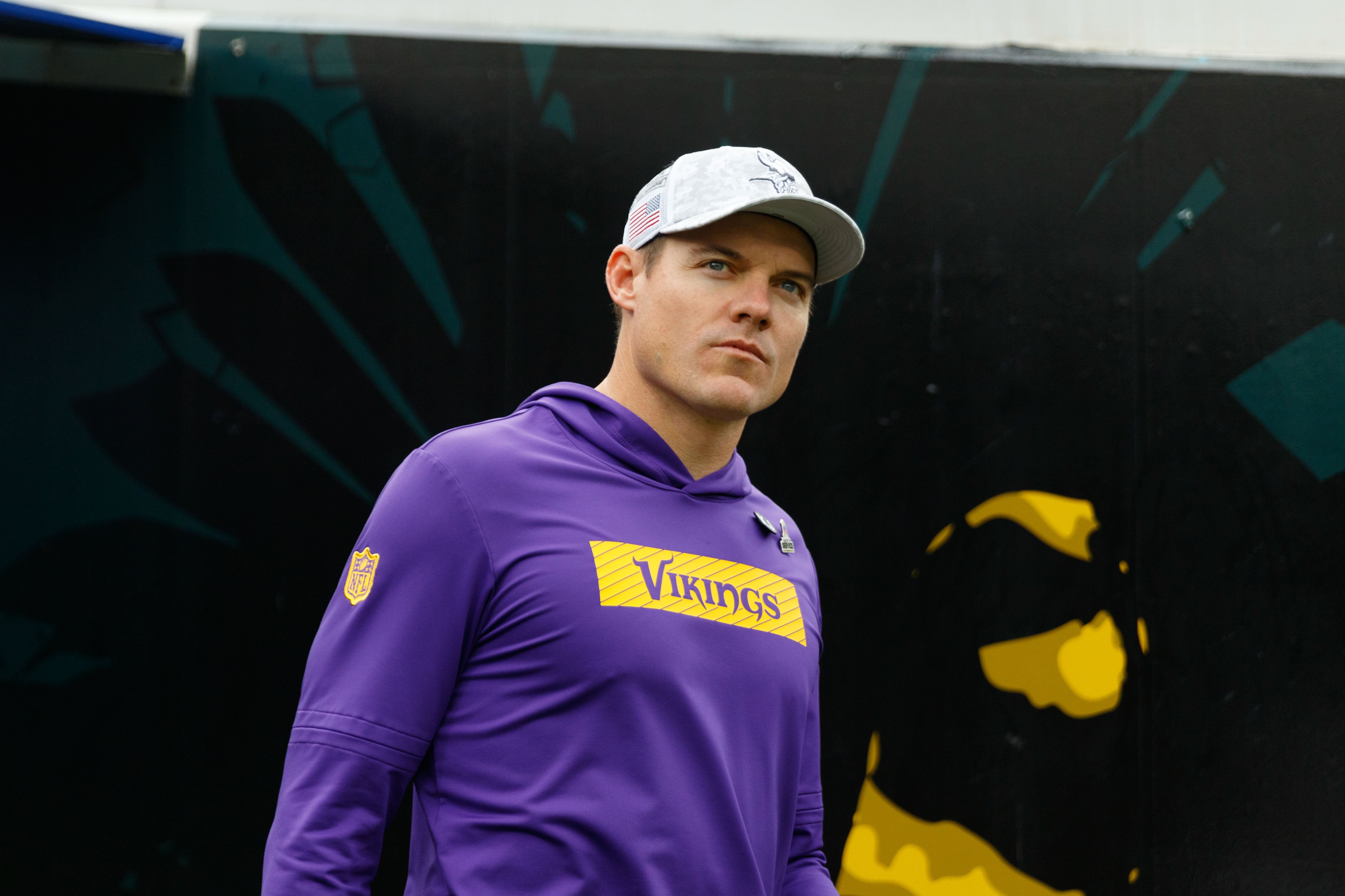 Nov 10, 2024; Jacksonville, Florida, USA; Minnesota Vikings head coach Kevin O'Connell walks out of the tunnel before the game against the Jacksonville Jaguars at EverBank Stadium.