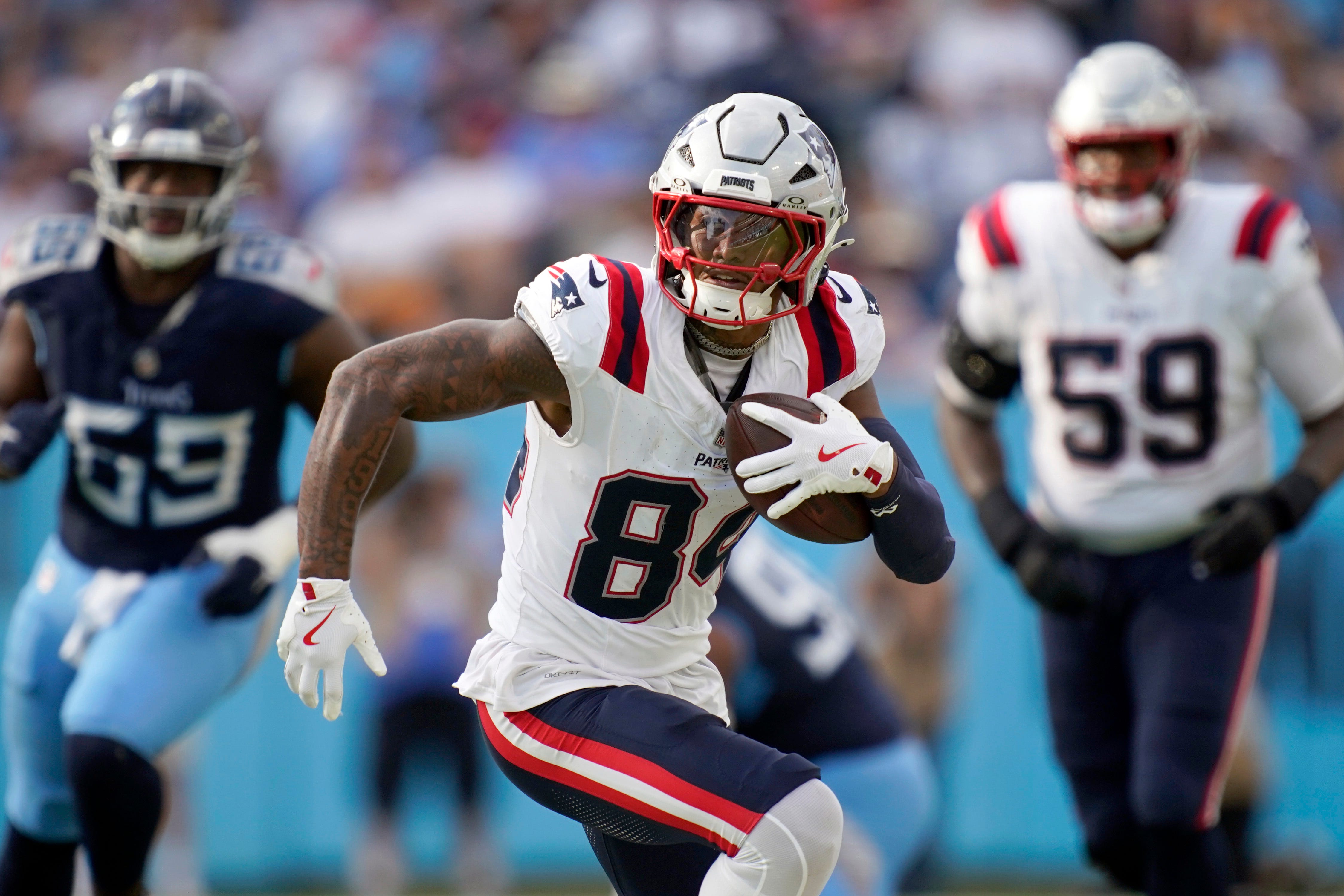 New England Patriots wide receiver Kendrick Bourne (84) runs the ball against the Tennessee Titans during the 4th quarter at Nissan Stadium in Nashville, Tenn., Sunday, Nov. 3, 2024.  Created: