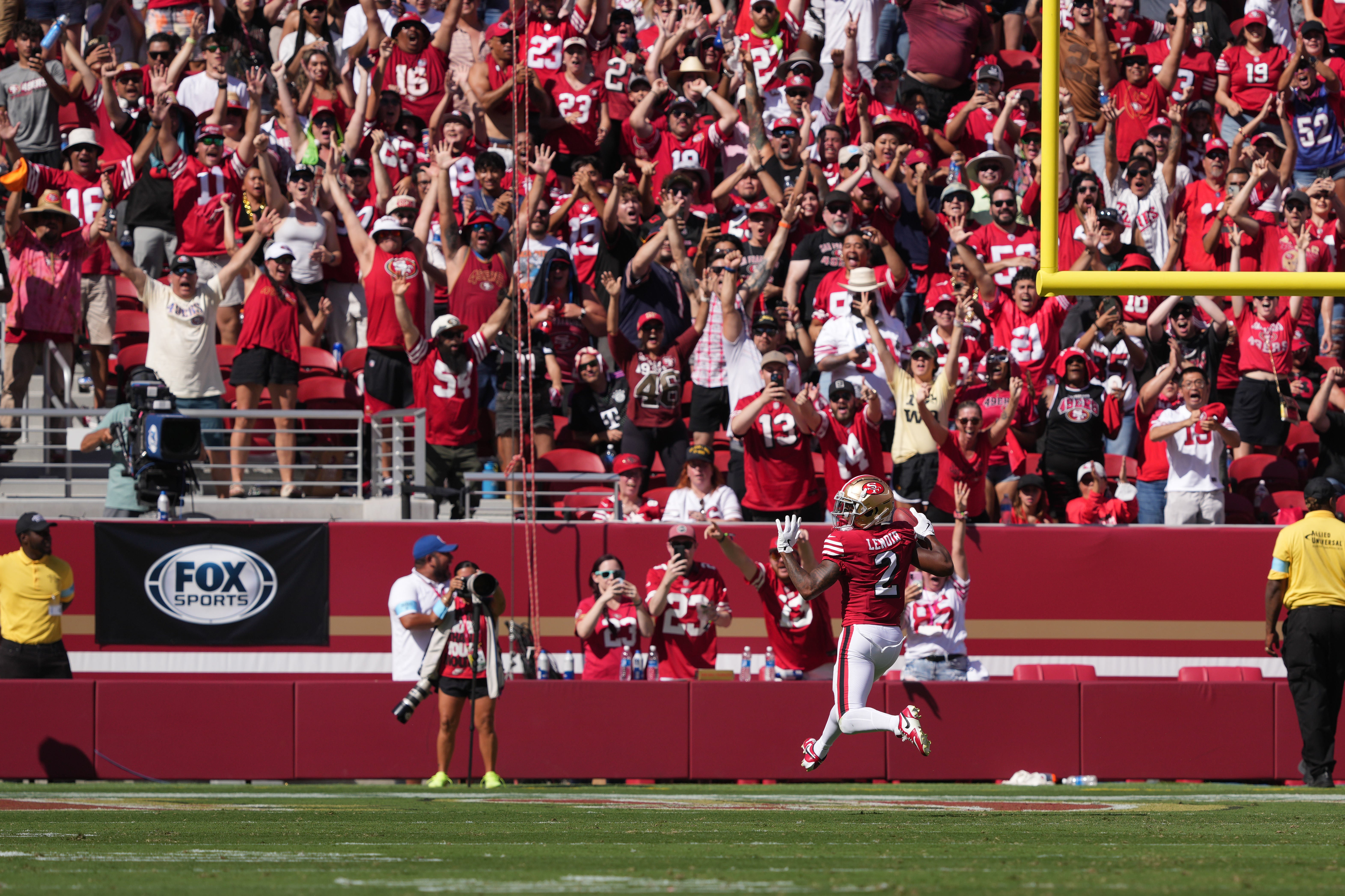 San Francisco 49ers cornerback Deommodore Lenoir (2) scores a touchdown after a blocked field goal attempt by the Arizona Cardinals during the second quarter at Levi's Stadium.