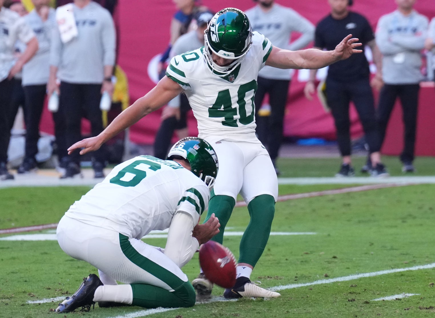 Nov 10, 2024; Glendale, Arizona, USA; New York Jets place kicker Spencer Shrader (40) kicks a field goal against the Arizona Cardinals during the first half at State Farm Stadium.