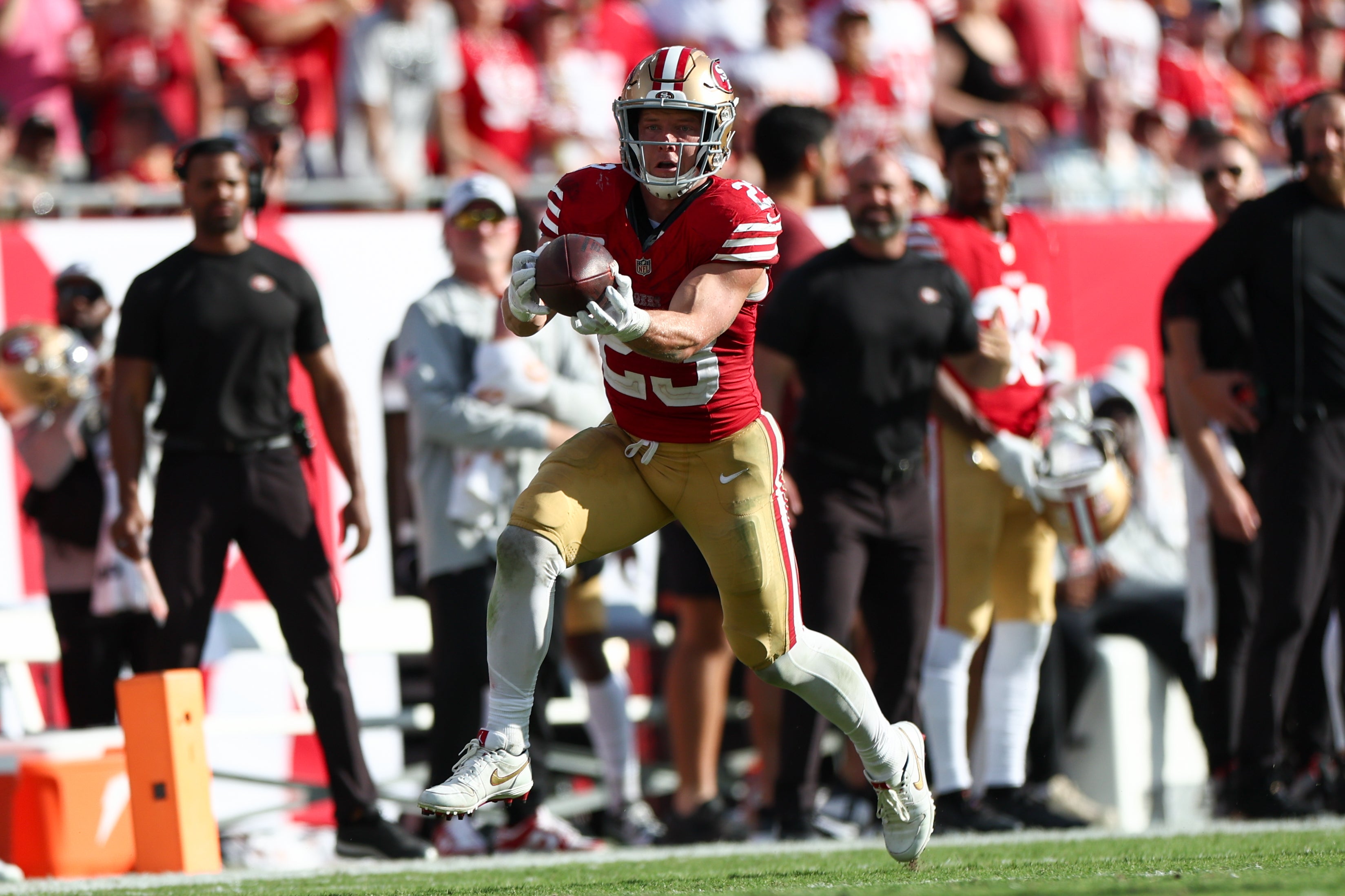 San Francisco 49ers running back Christian McCaffrey (23) receives a pass against the Tampa Bay Buccaneers in the fourth quarter at Raymond James Stadium.