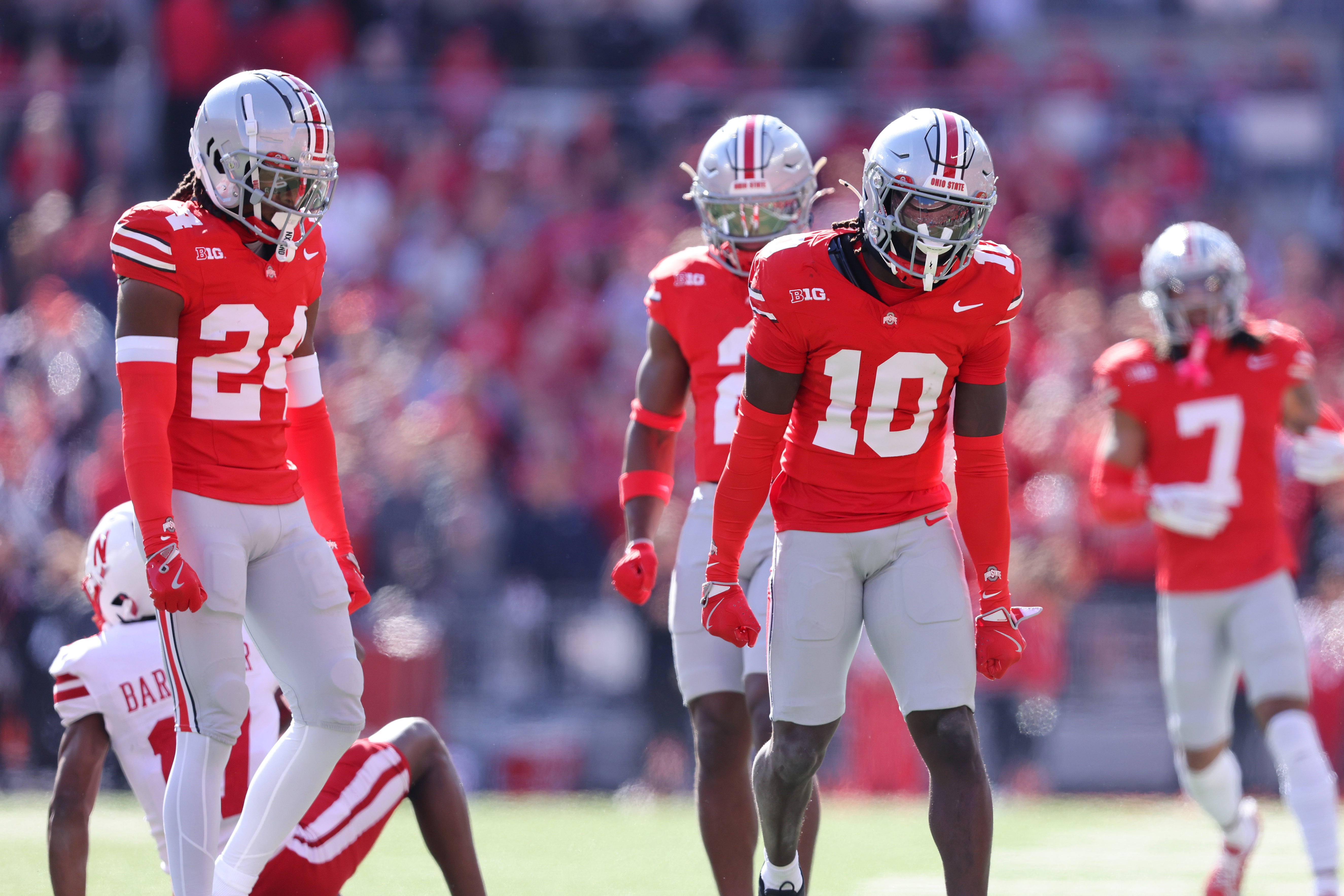 Oct 26, 2024; Columbus, Ohio, USA; Ohio State Buckeyes cornerback Denzel Burke (10) celebrates a tackle for a loss during the first quarter against the Nebraska Cornhuskers at Ohio Stadium.