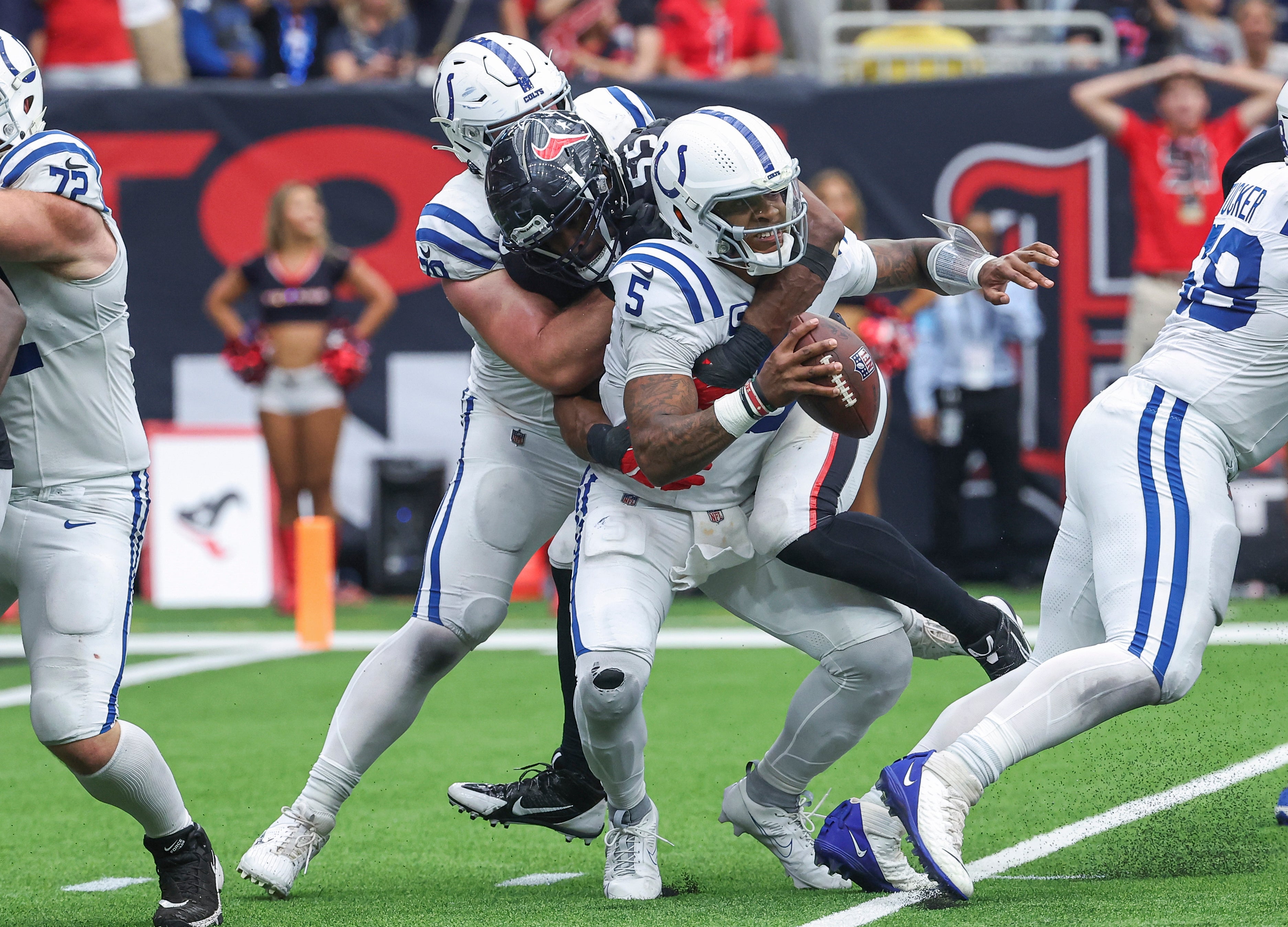 Oct 27, 2024; Houston, Texas, USA; Houston Texans defensive end Danielle Hunter (55) sacks Indianapolis Colts quarterback Anthony Richardson (5) during the fourth quarter at NRG Stadium.