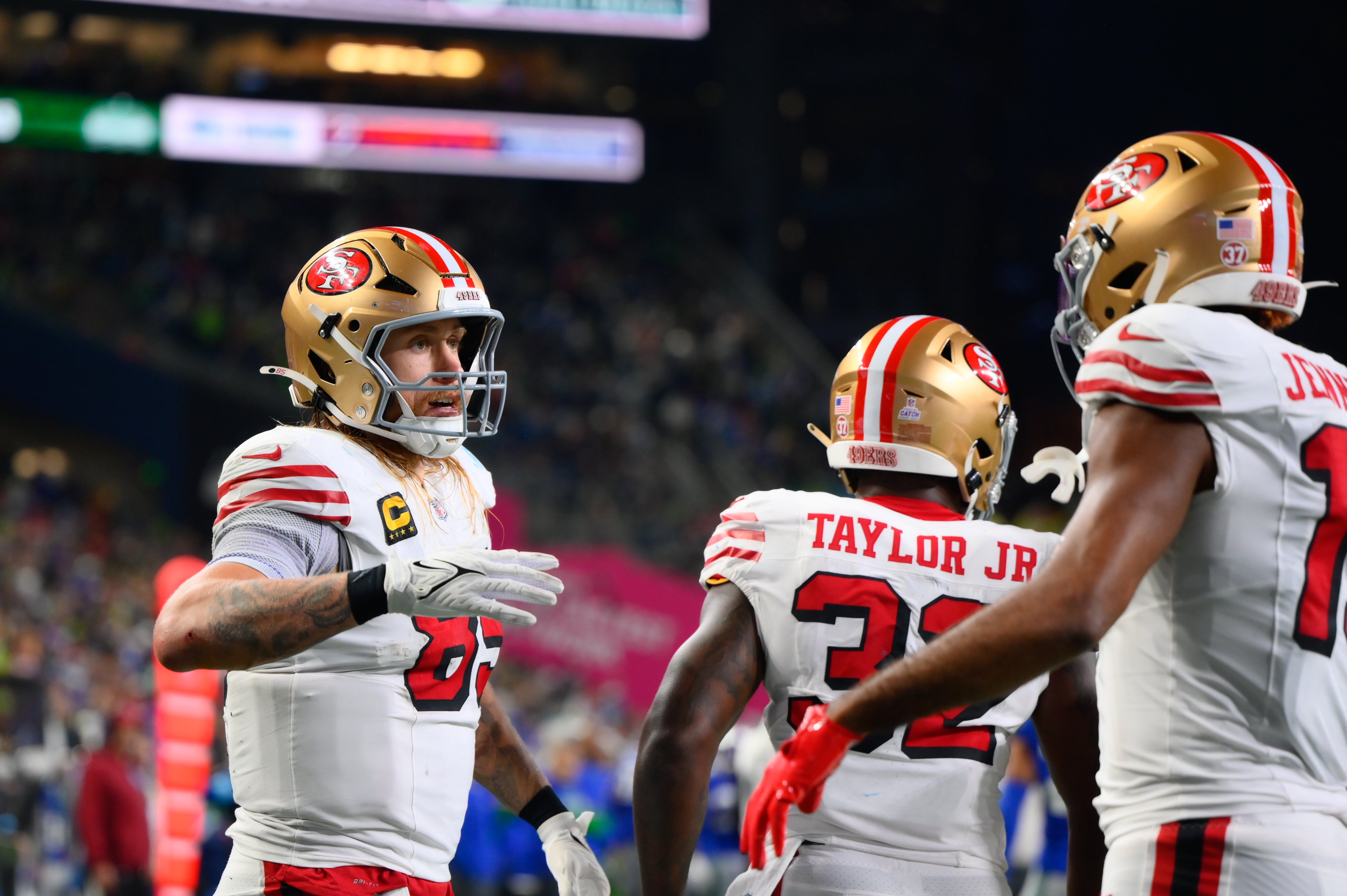 San Francisco 49ers tight end George Kittle (85) celebrates after scoring a touchdown against the Seattle Seahawks during the second half at Lumen Field.