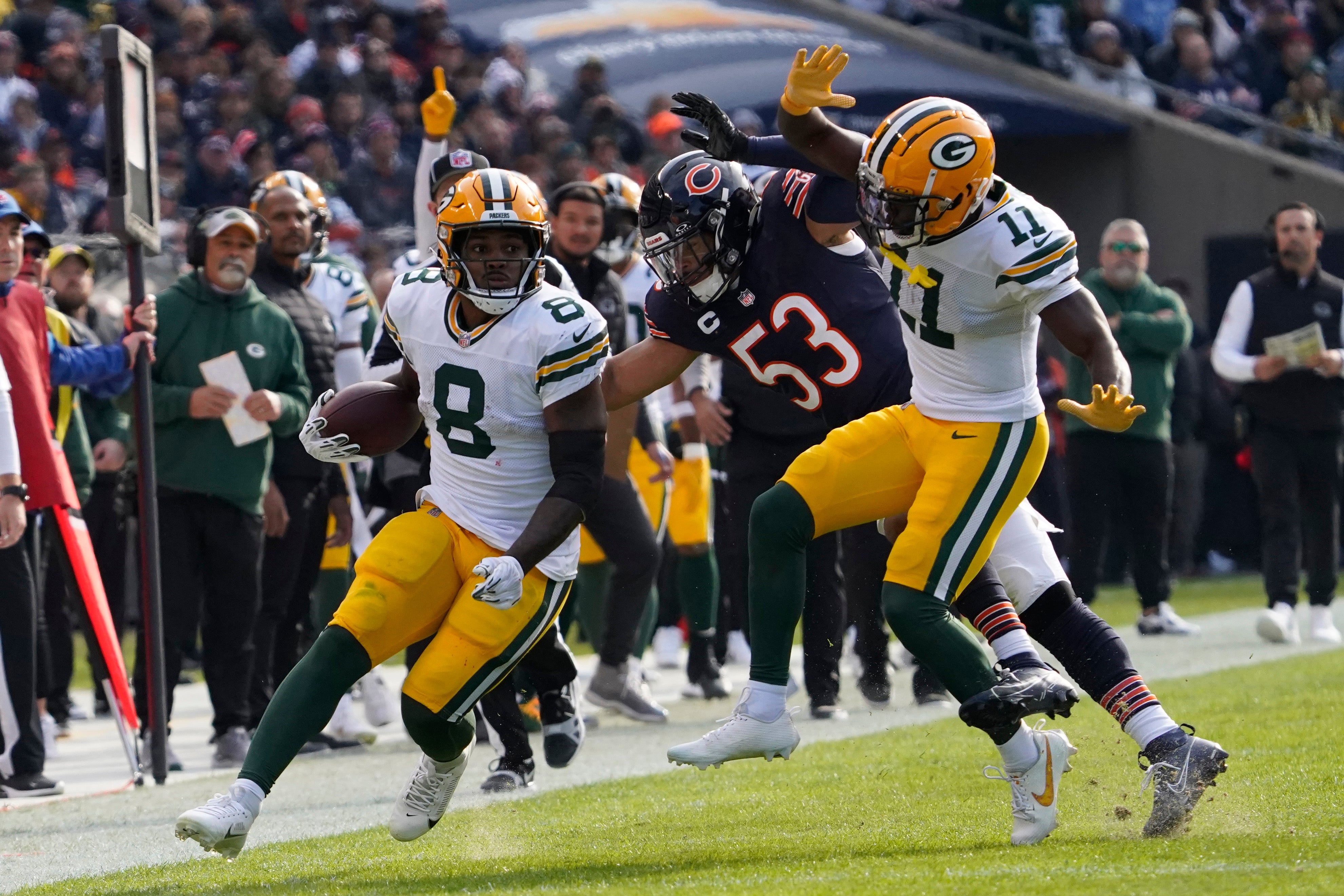 Chicago Bears linebacker T.J. Edwards (53) tries to tackle Green Bay Packers running back Josh Jacobs (8) during the first half at Soldier Field.