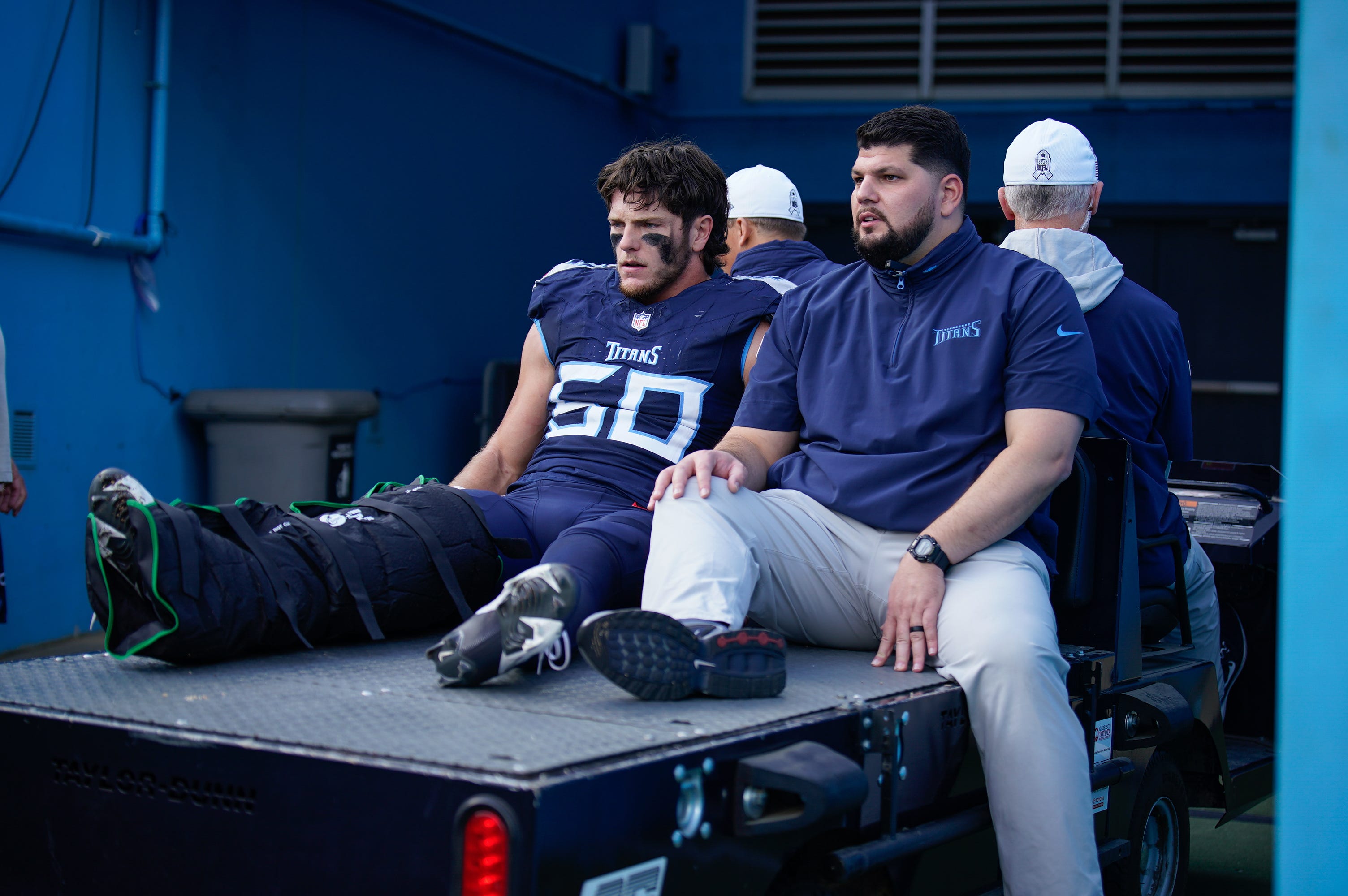 Tennessee Titans linebacker Jack Gibbens (50) is carted off the field during the third quarter against the Minnesota Vikings at Nissan Stadium in Nashville, Tenn., Sunday, Nov. 17, 2024 Denny Simmons / The Tennessean-USA TODAY NETWORK via Imagn Images