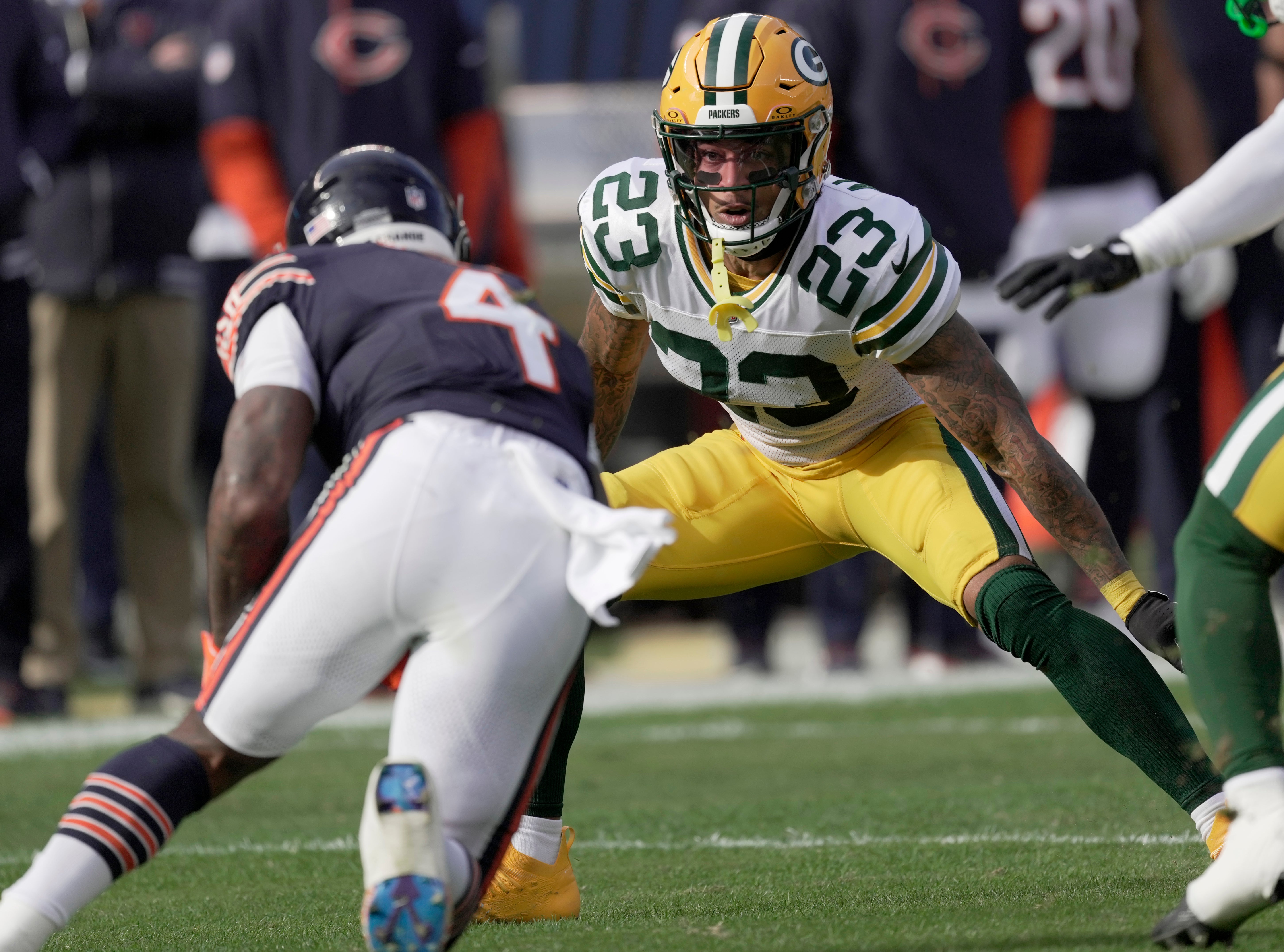 Green Bay Packers cornerback Jaire Alexander (23) tackles Chicago Bears running back D'Andre Swift (4) during the first quarter of their game Sunday, November 17, 2024 at Solider Field in Chicago, Illinois.