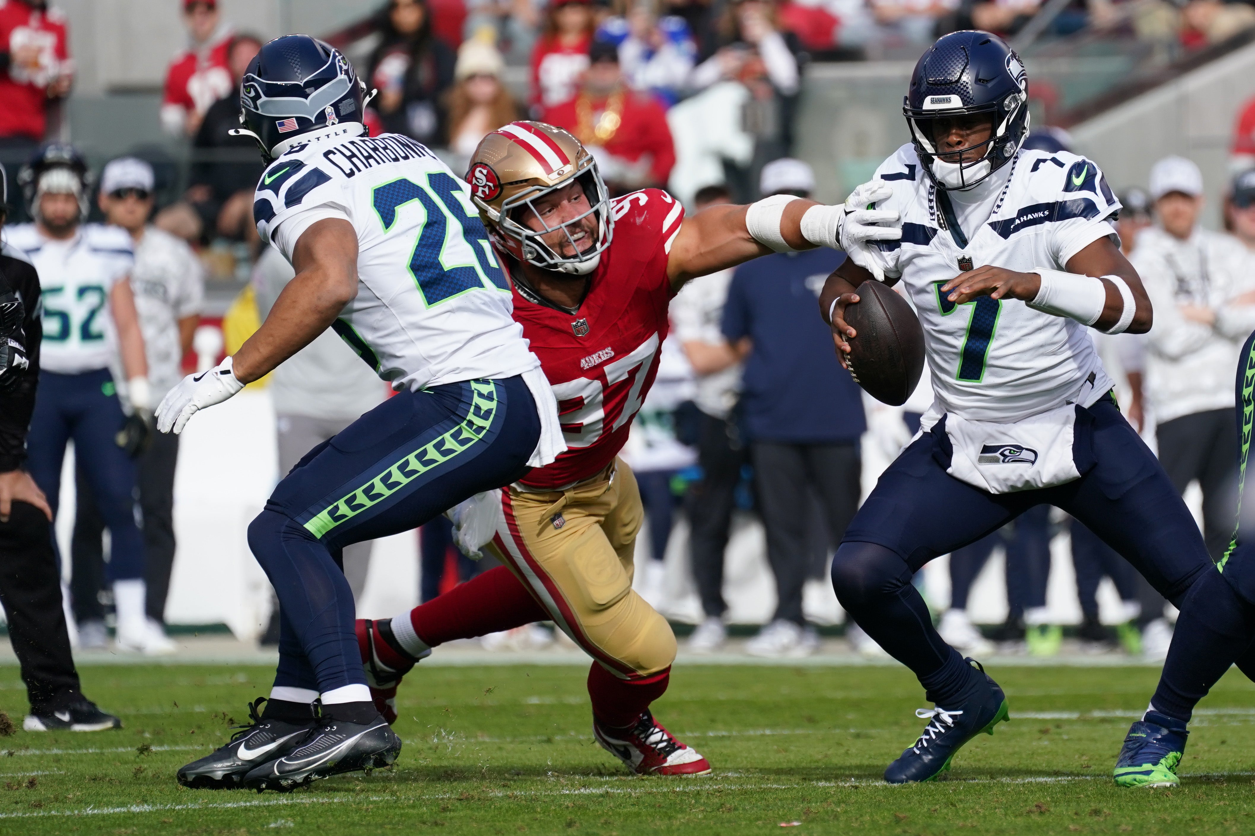 San Francisco 49ers defensive end Nick Bosa (97) sacks Seattle Seahawks quarterback Geno Smith (7) in the first quarter at Levi's Stadium.