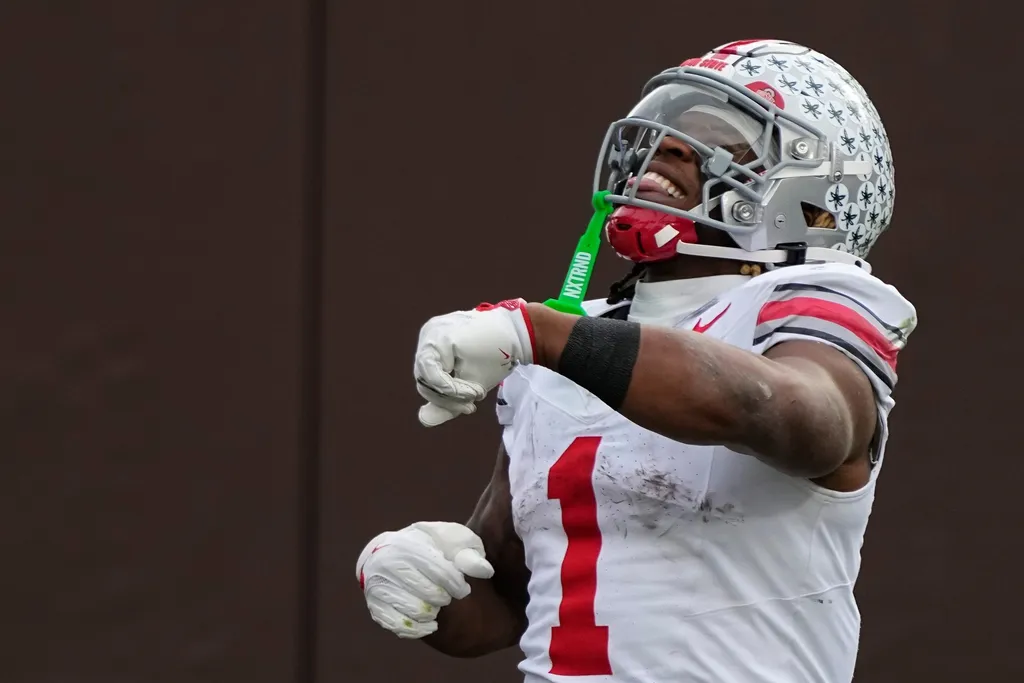 Ohio State Buckeyes running back Quinshon Judkins (1) celebrates a touchdown during the first half of the NCAA football game against the Northwestern Wildcats at Wrigley Field in Chicago on Saturday.