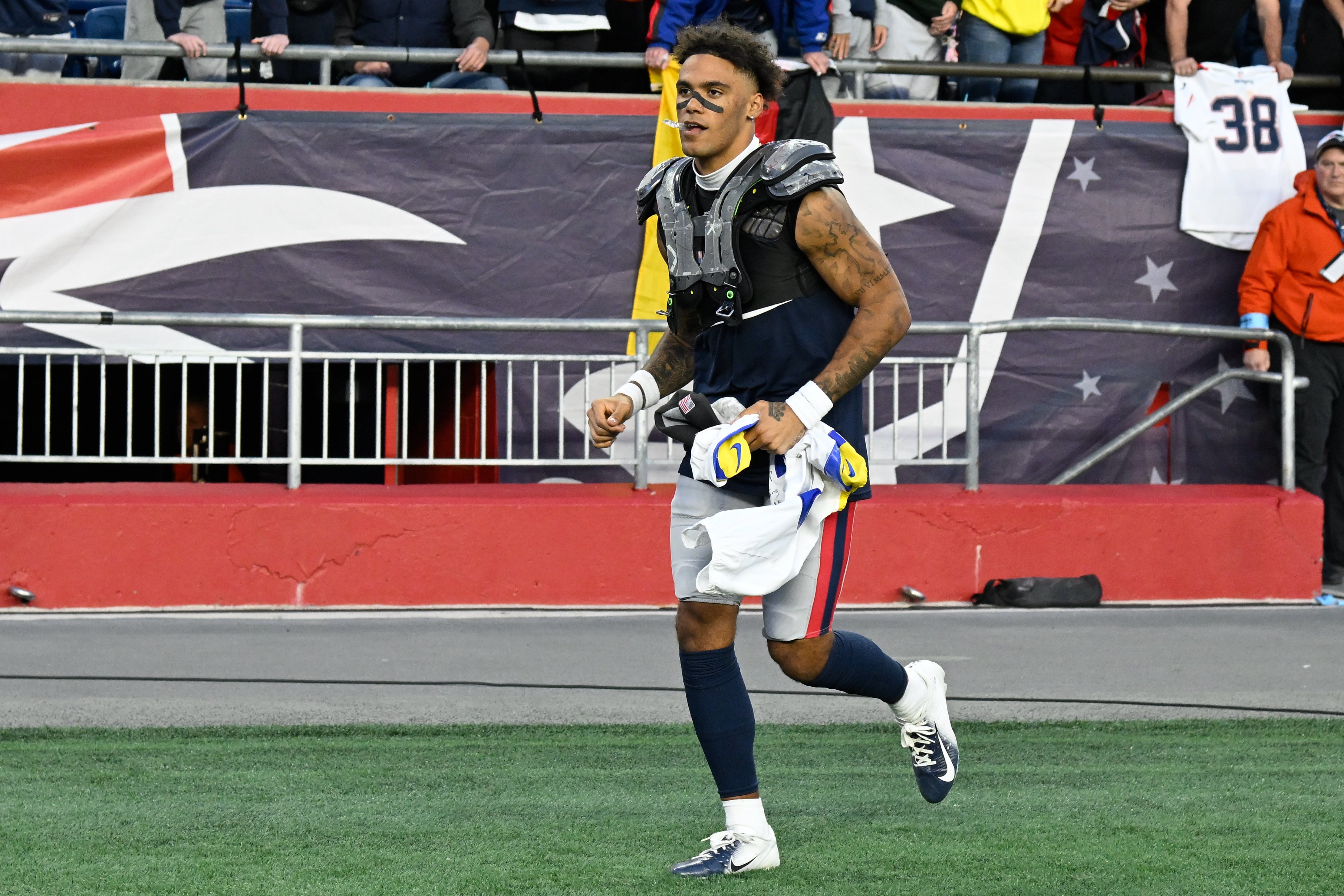 Nov 17, 2024; Foxborough, Massachusetts, USA; New England Patriots cornerback Christian Gonzalez (0) leaves the field after game against the Los Angeles Rams at Gillette Stadium.
