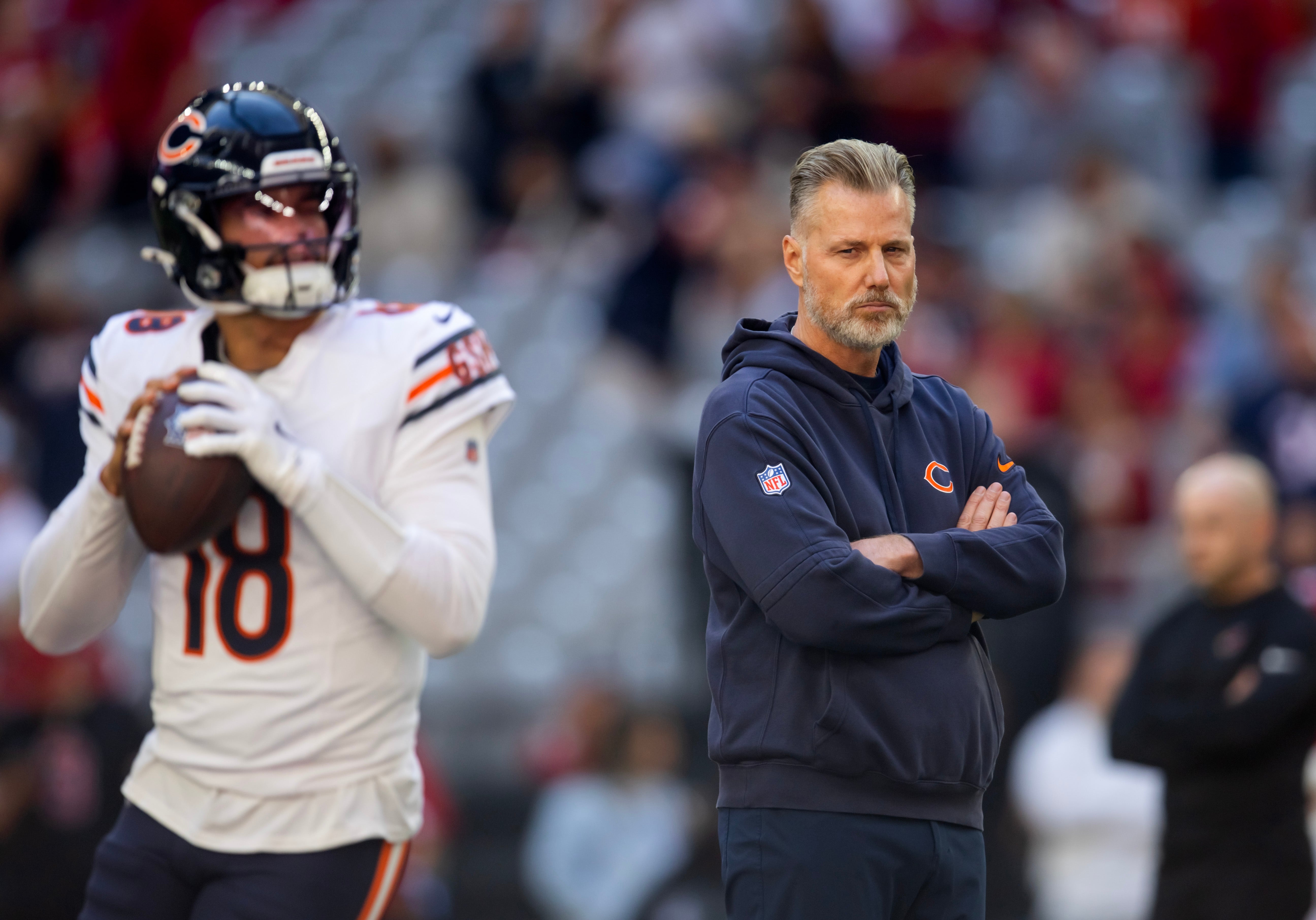 Nov 3, 2024; Glendale, Arizona, USA; Chicago Bears head coach Matt Eberflus watches quarterback Caleb Williams (18) prior to the game against the Arizona Cardinals at State Farm Stadium.